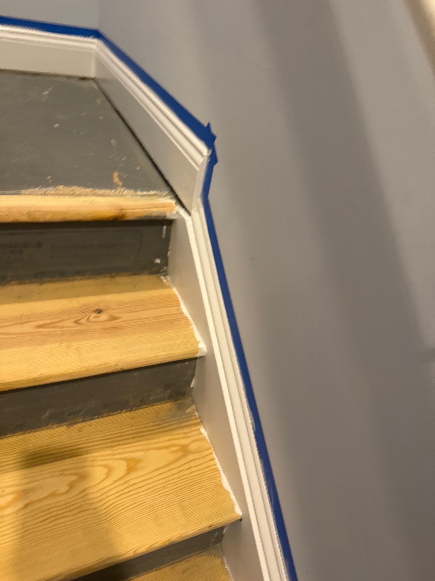 Stairway Installation using t vinyl stair tread and reversibleriser by La Bendicion Contruction Llc