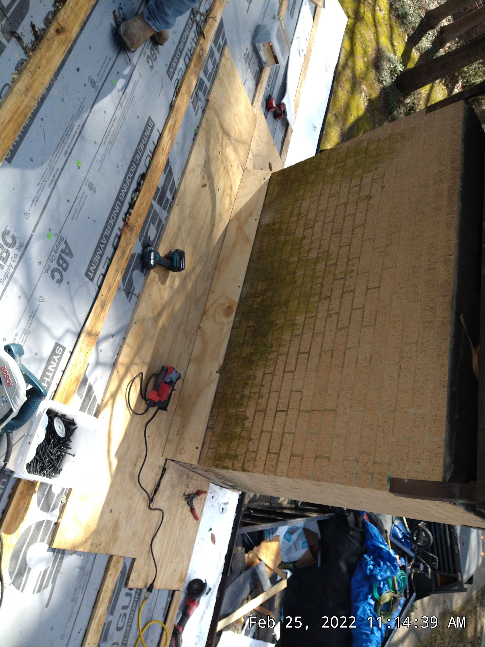 Residential Roofing Installation using PVC membrane and 24 gauge Standing Seam Metal by Hostetler Roofing