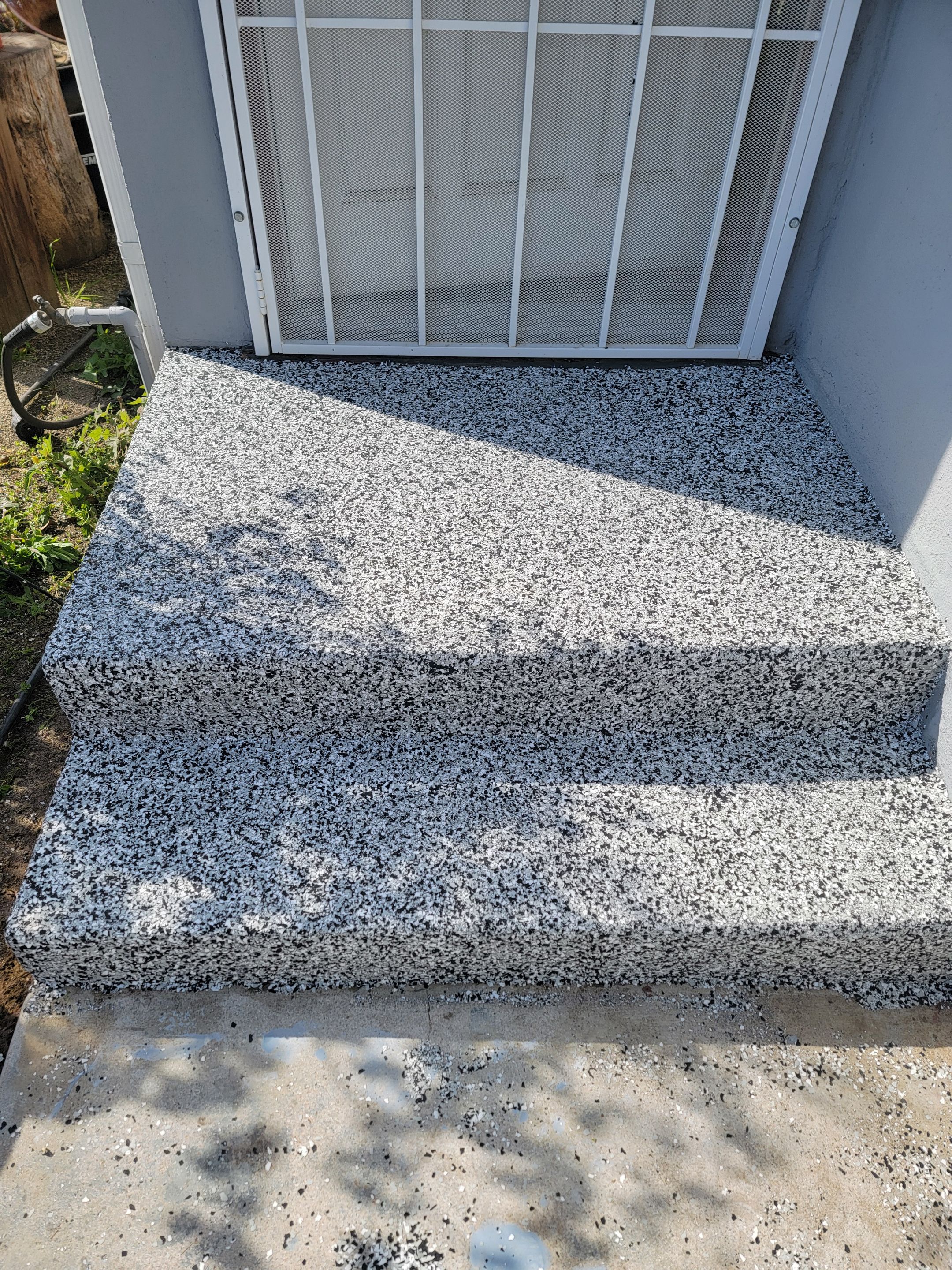 Front Porch and walkway by MGP Coatings