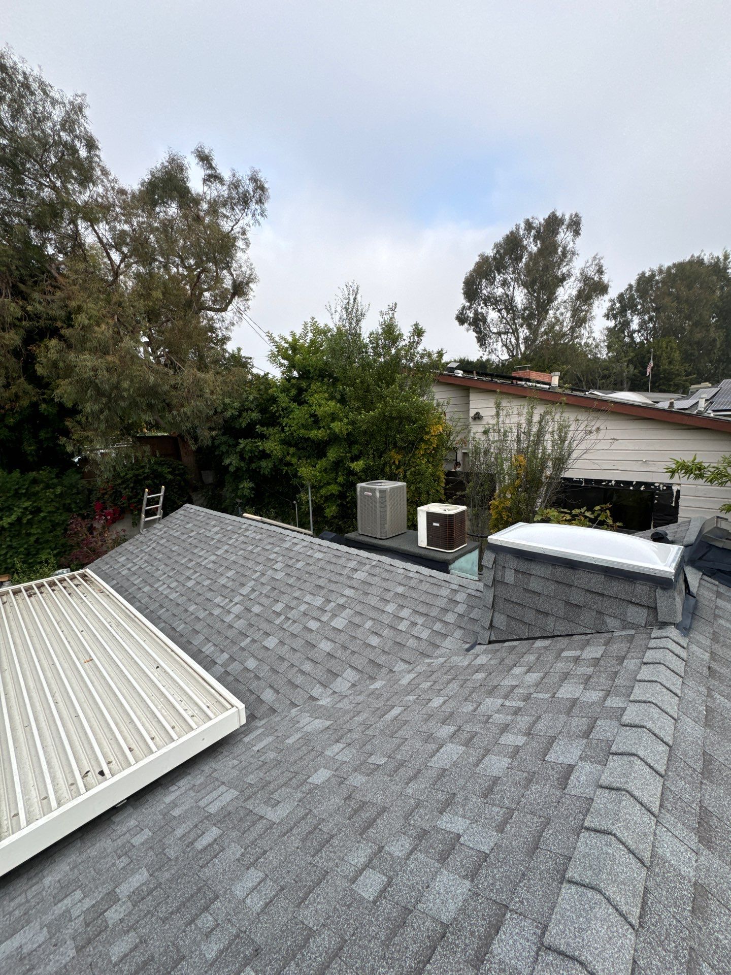 Residential Roofing Installation using Shingles and Silicone by Hull Brothers Roofing