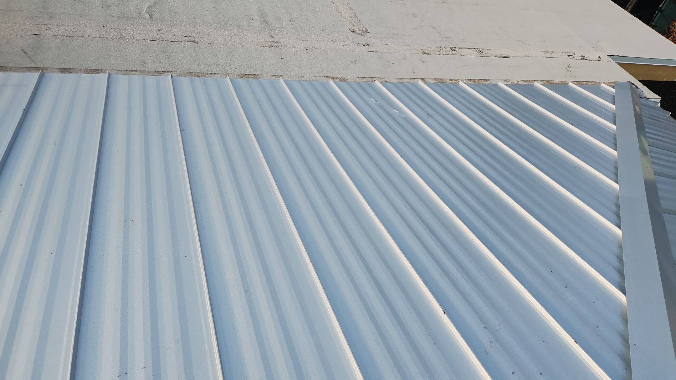 Residential Roofing Installation using 1" Nail strip metal roof by BLUES BROTHERS ROOFING