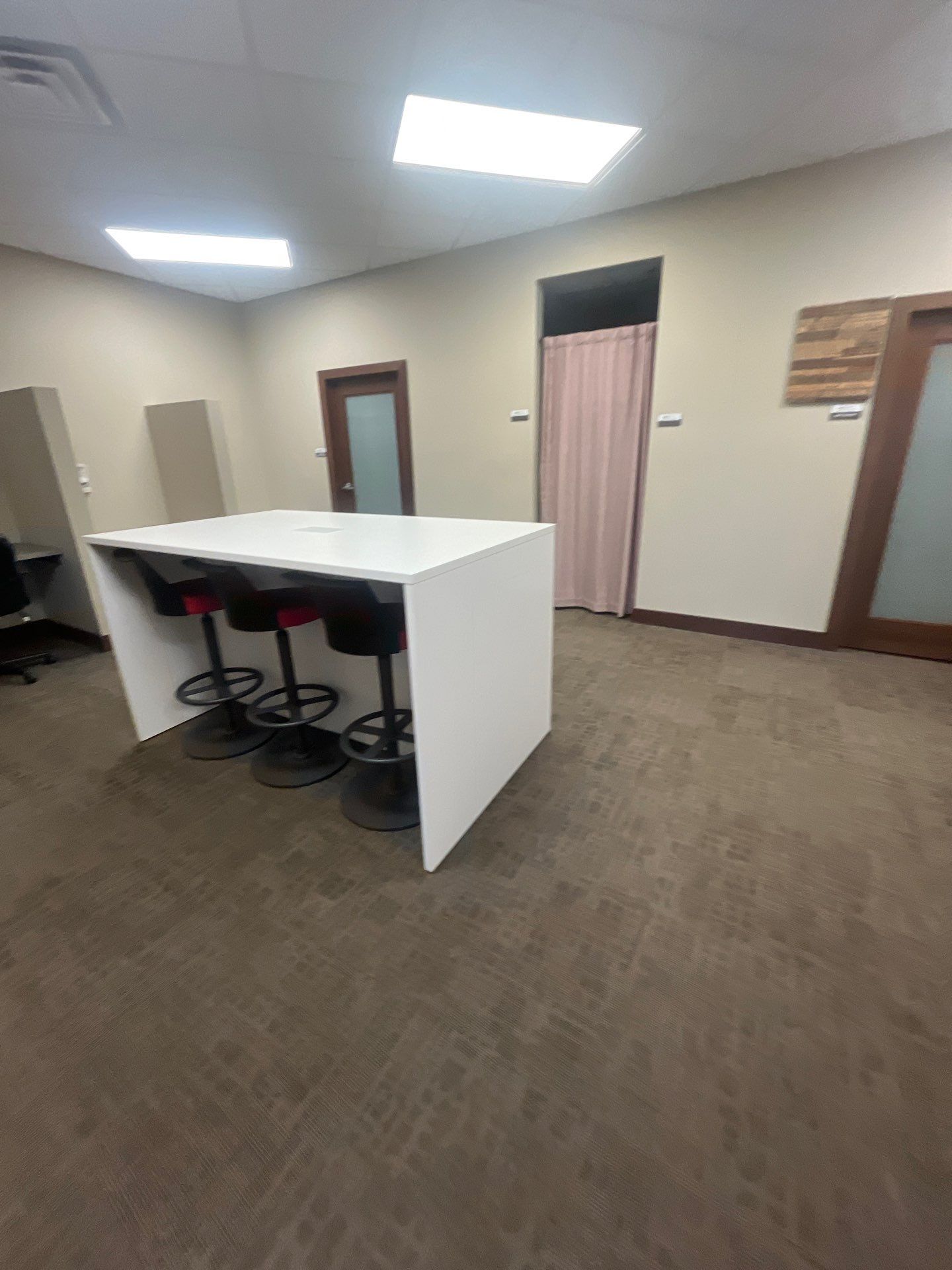 Commercial Office Interior Remodel and Modern Suite Refresh in Sioux Falls by Select Painting, Coatings & Garage Cabinets