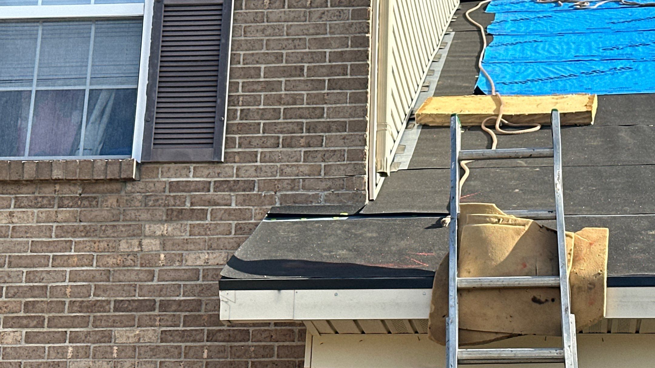 West Hamilton - Pristine Black & Gutters by Tamlin Roofing