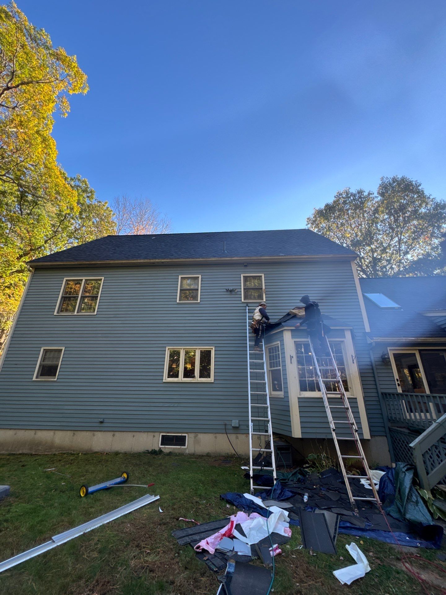 Milford Complete Roof Replacement with Velux Skylight Upgrade by Mighty Dog Roofing of Greater Middlesex County
