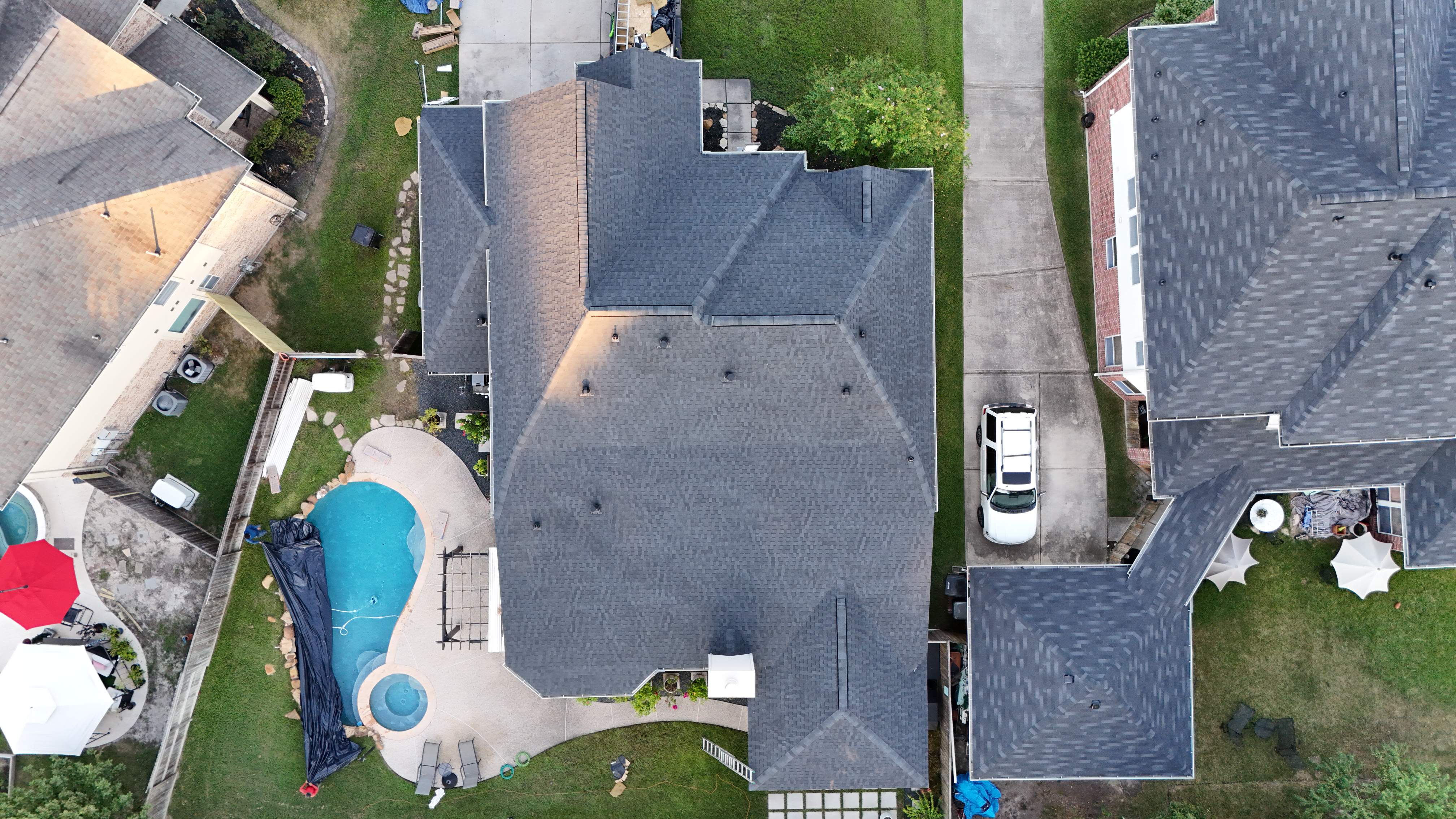 Poolside Home Roof Replacement — Spring, TX by PL Roofing & SB Roofing, LLC.