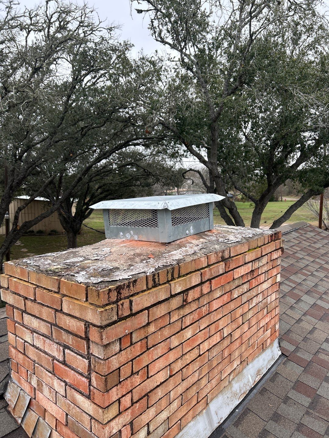 Residential Roofing Repair using Custom Fabricated Metal Spark Arrestor by Lighthouse Roofing