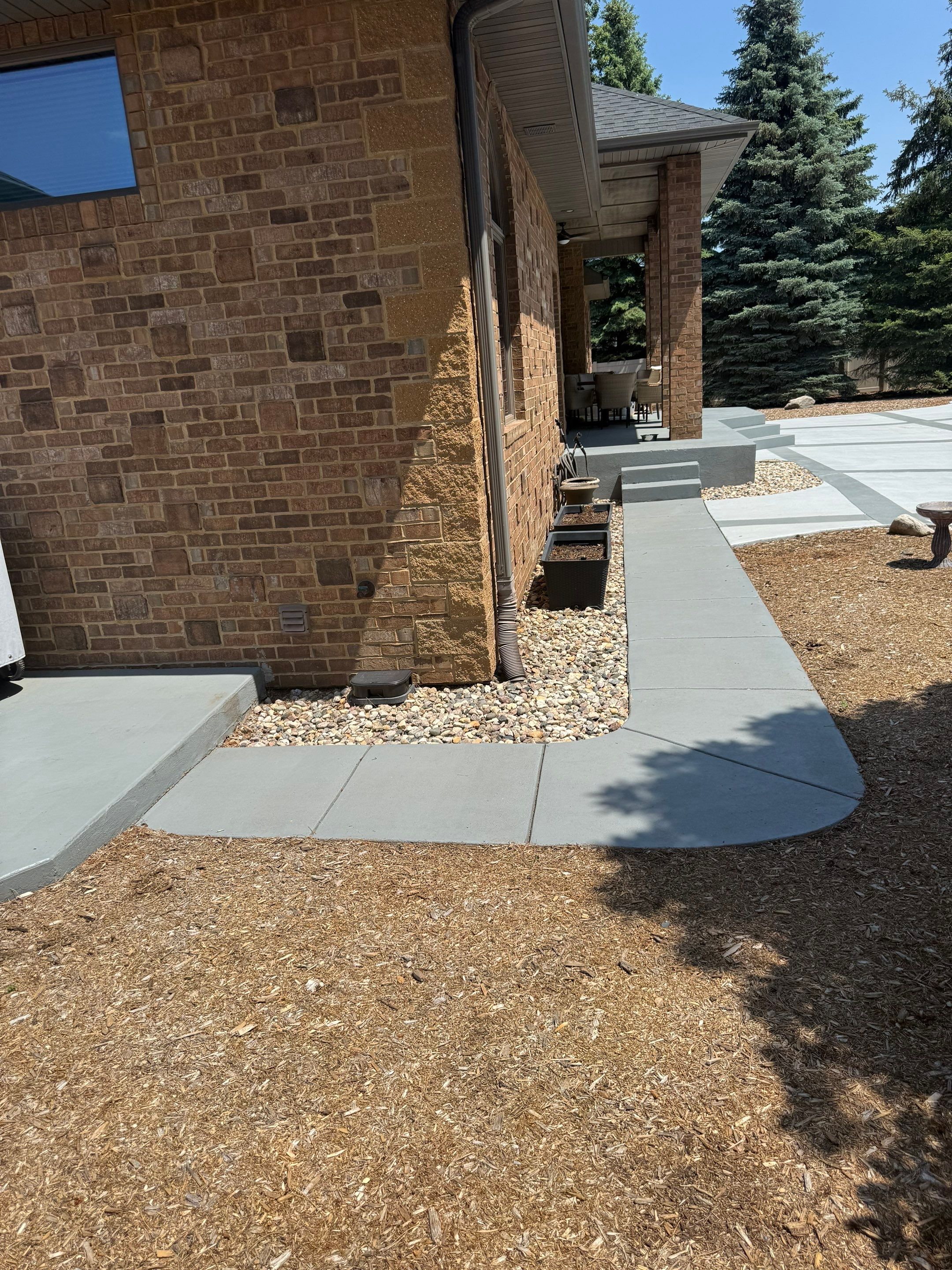 Decorative Concrete Pool Deck and Patio Resurfacing in Sioux Falls by Select Painting, Coatings & Garage Cabinets