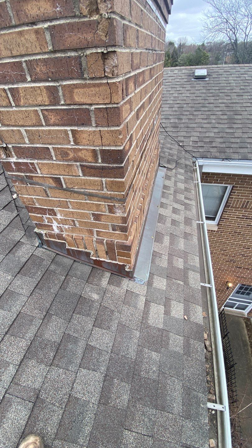 Asphalt Roof Replacement and Aluminum Gutter Installation by Custom Installations