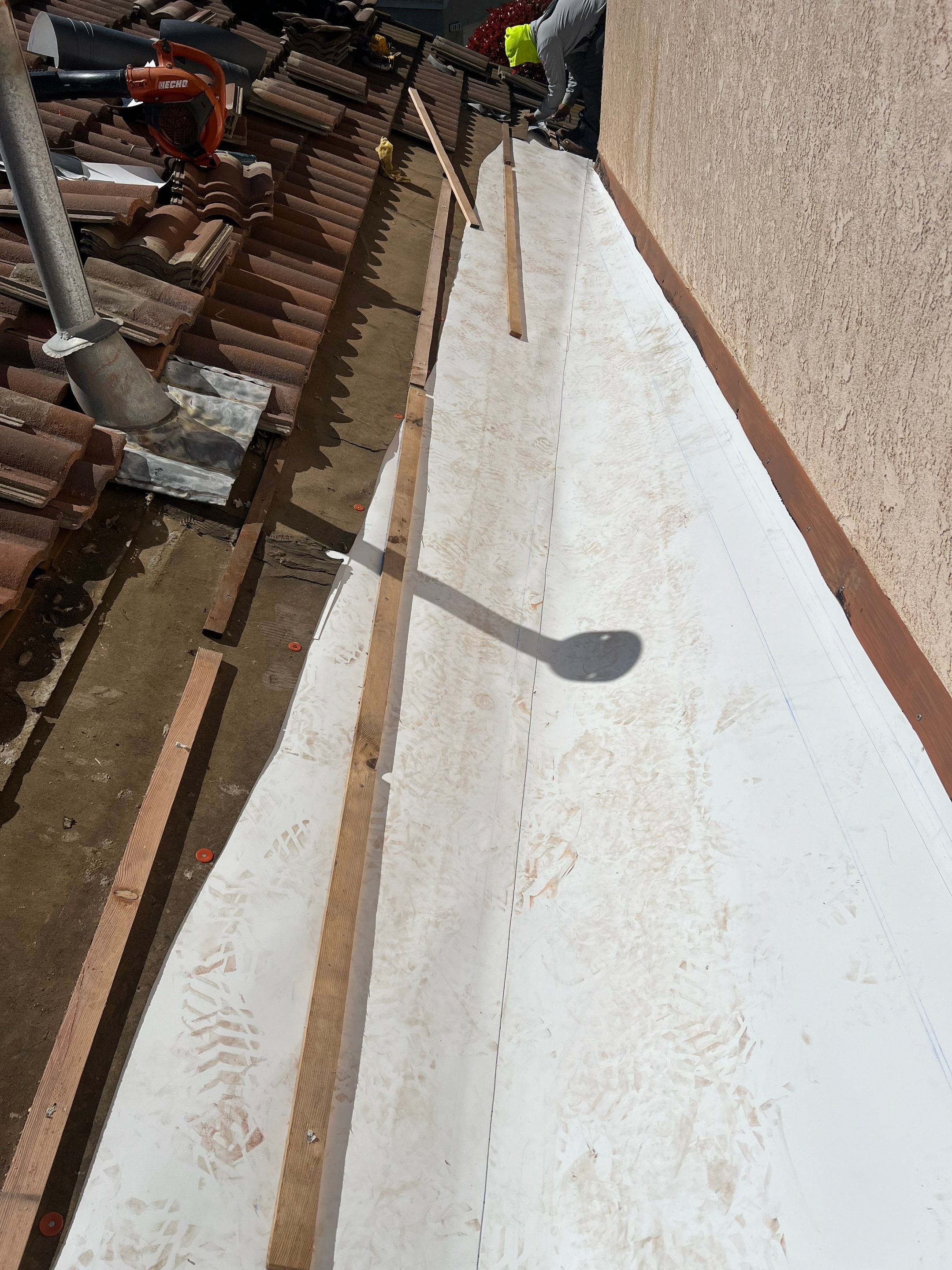 Tile Roof repair by Grandmark Service Company