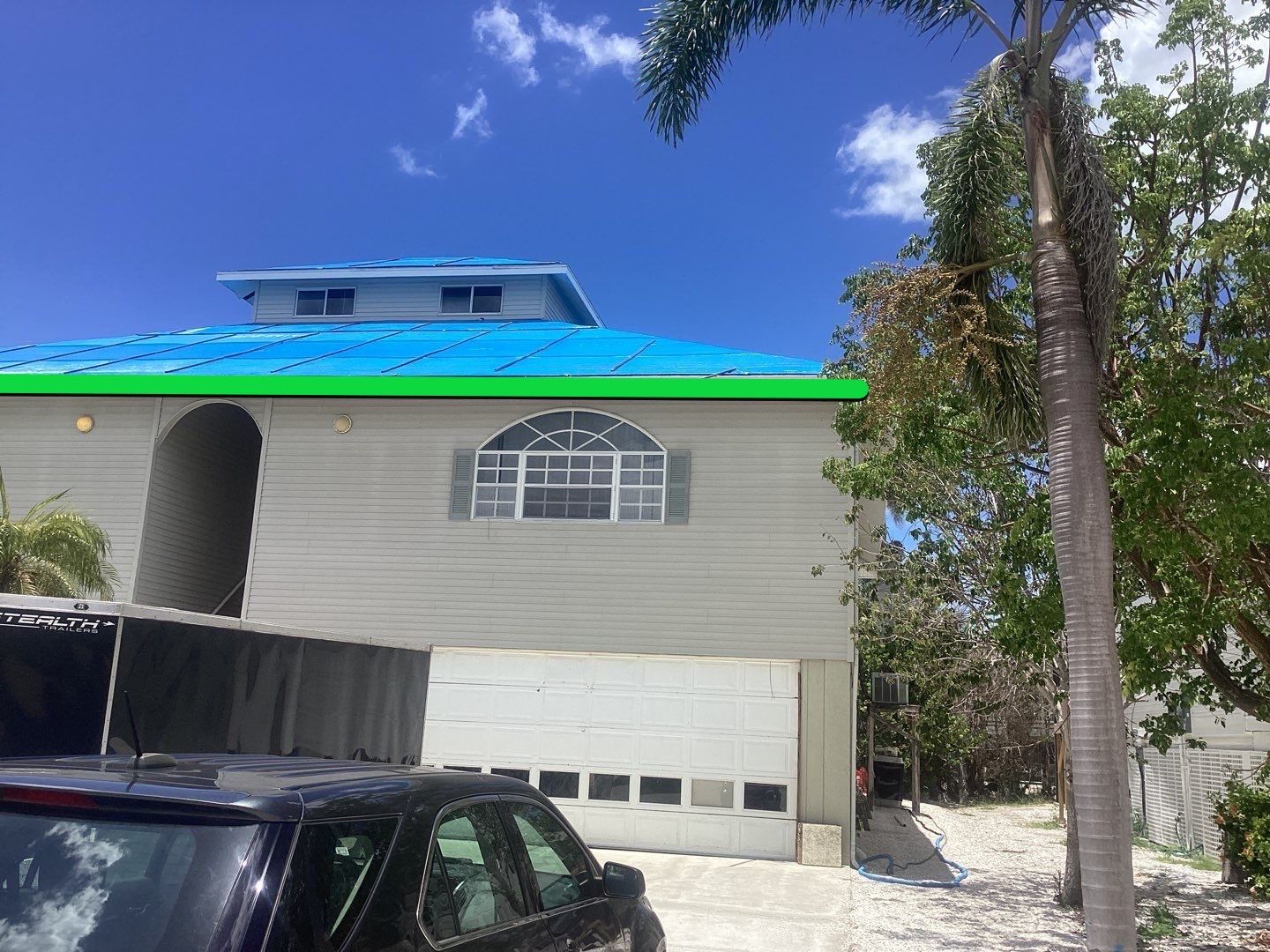 Complete Gutter System with Downspouts & Guards in Fort Myers Beach FL by Gutter Professors