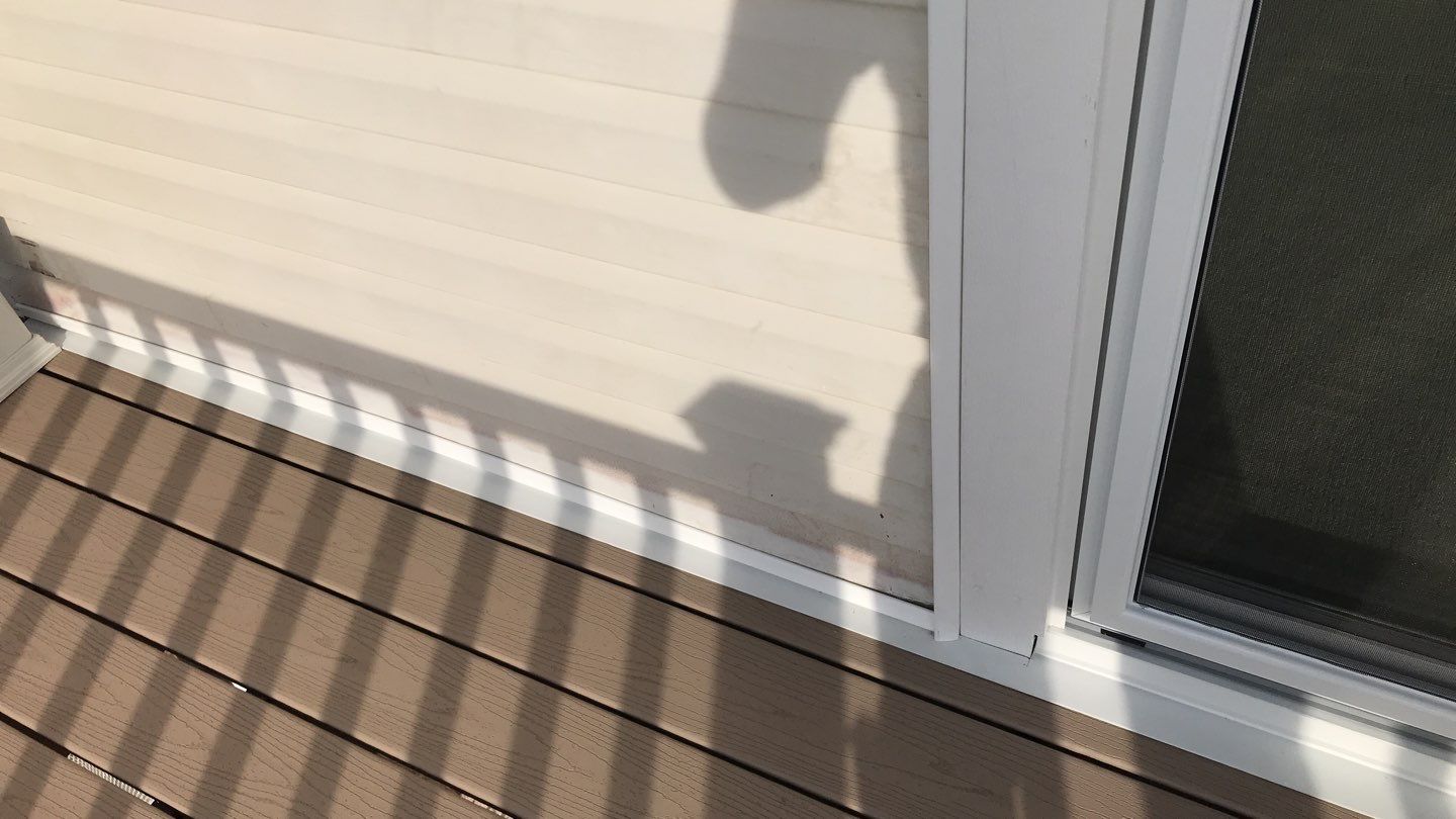 Deck Refurbush and Door Replacement using Trex Decking and Railing. Polaris Patio Doors by Secure Construction Company Inc