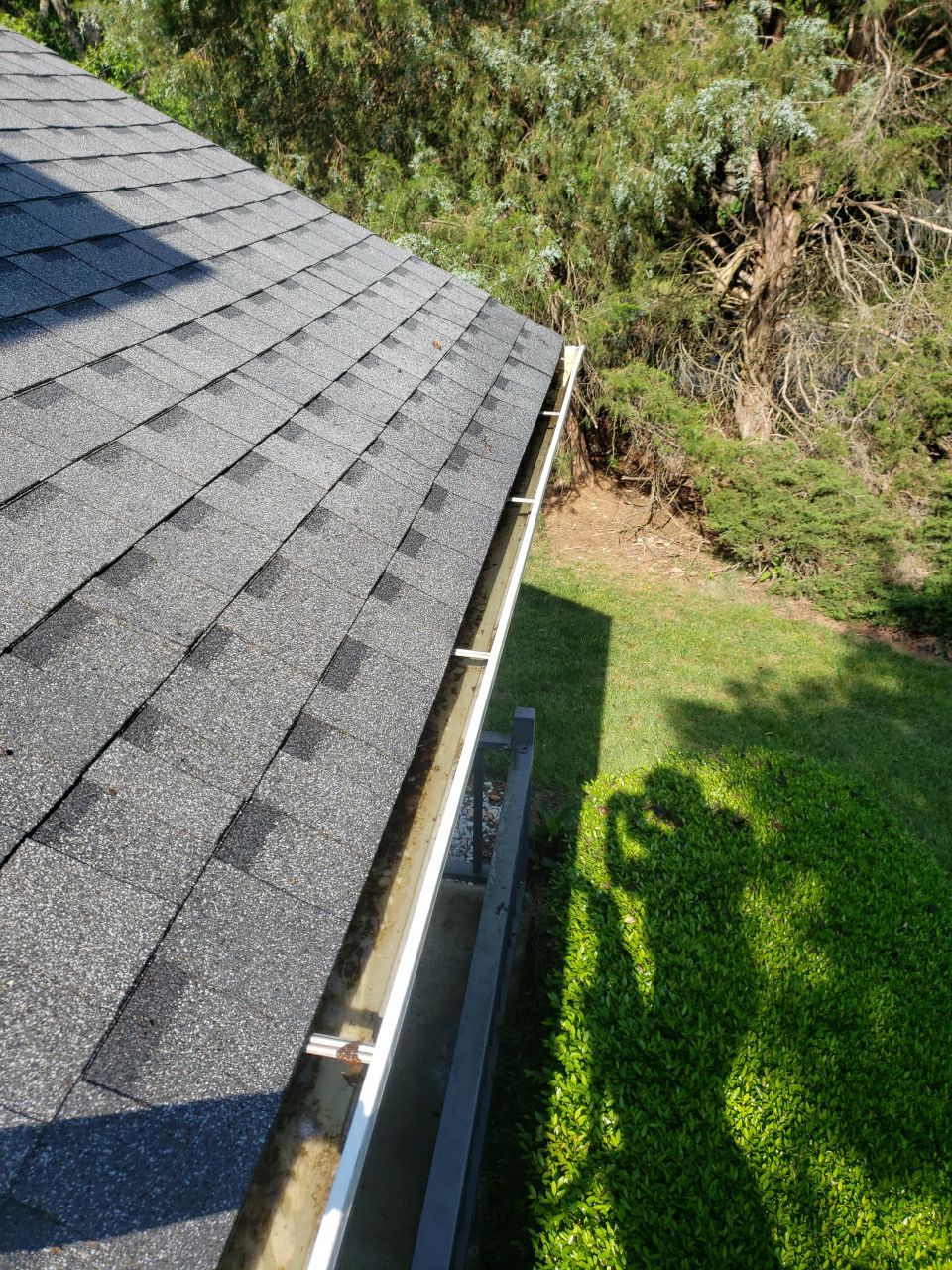 Gutter Cleaning using water by Power Wash Masters LLC
