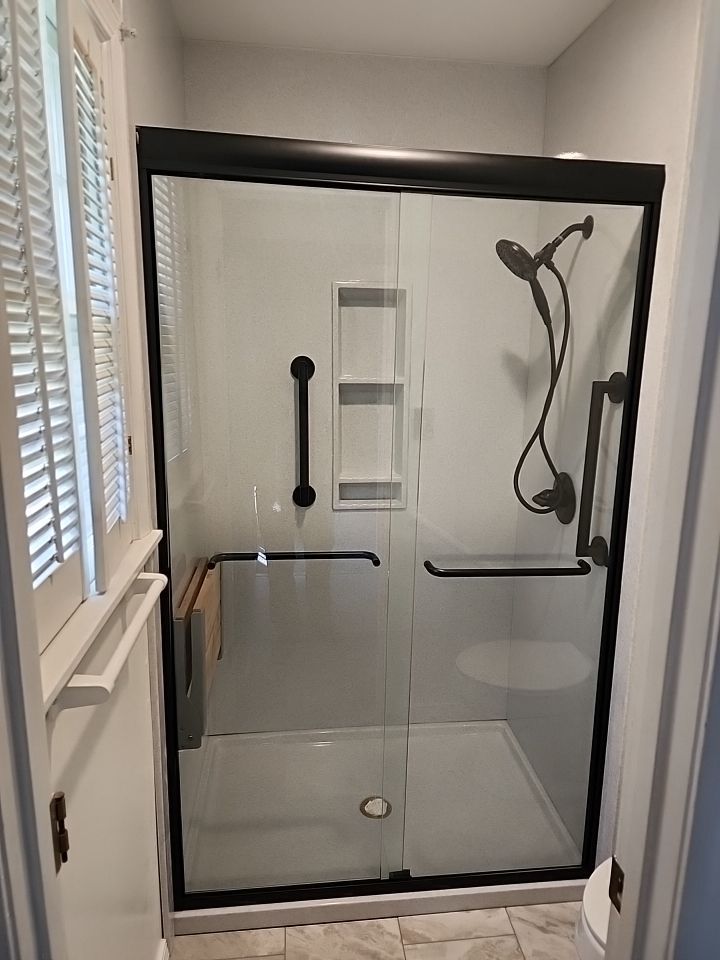 New shower, flooring, and countertop by The Shower Company