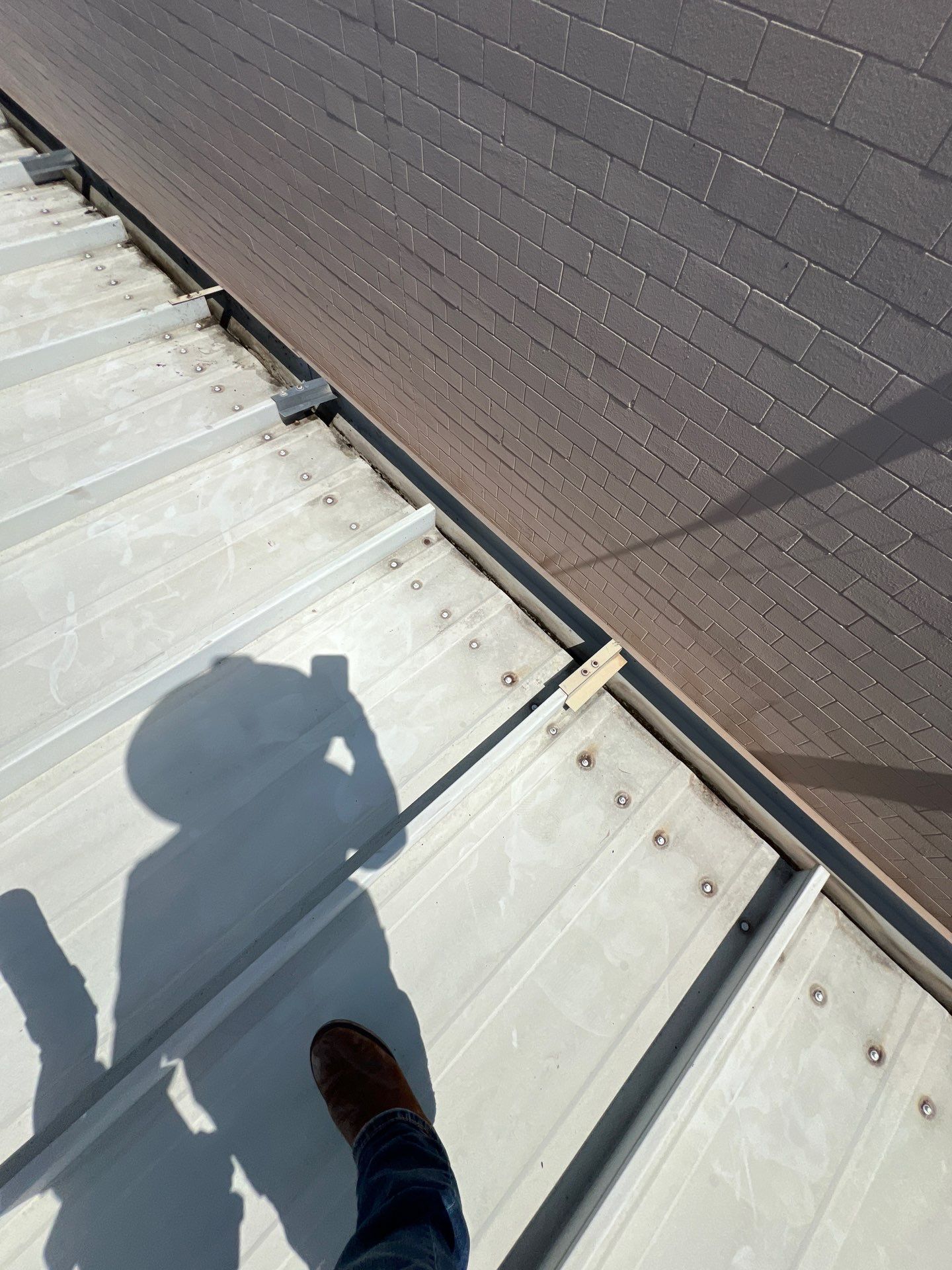 Commercial Roofing Repair using Metal by Roof Repair Company