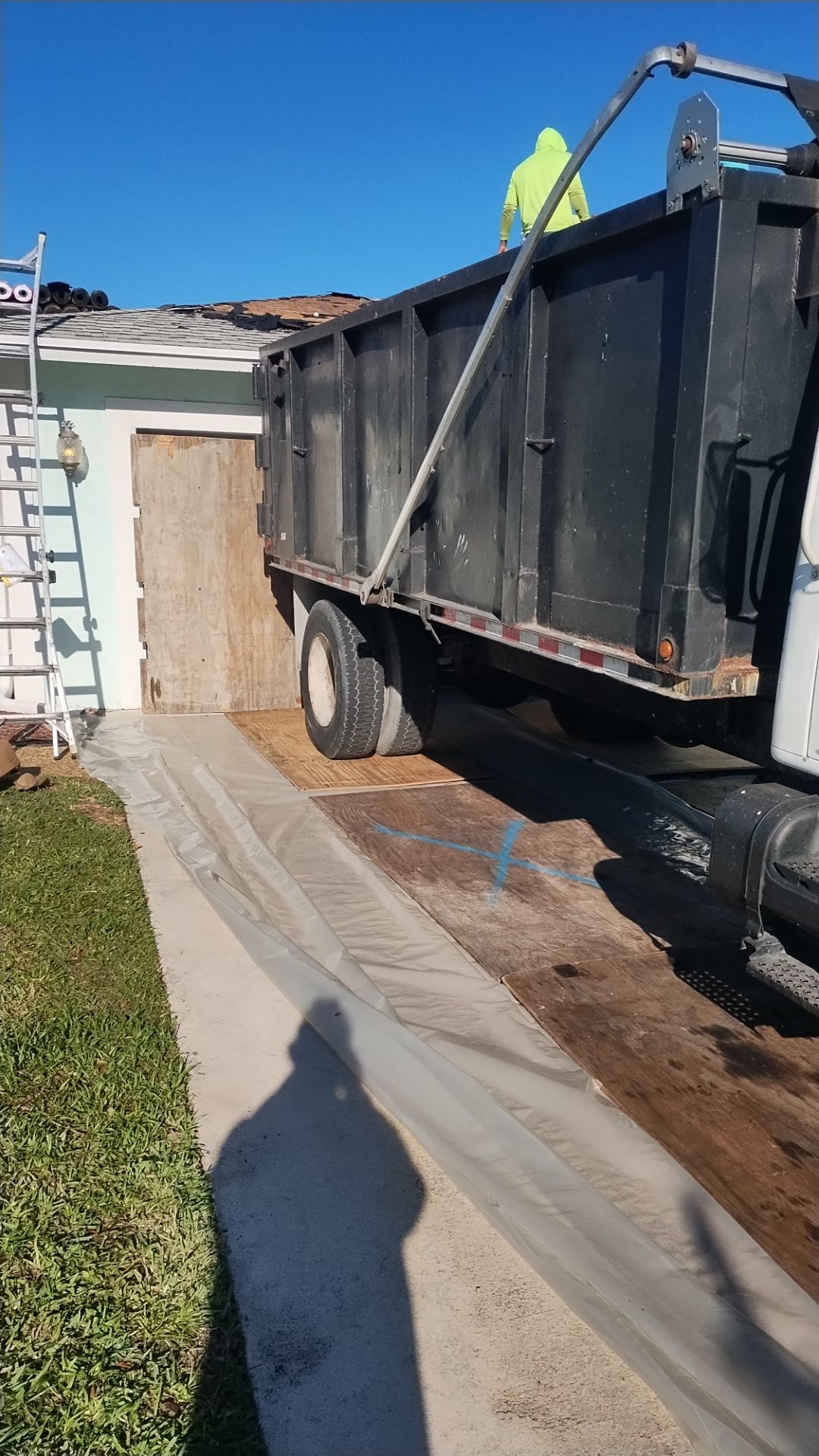 Residential Roofing Installation using 1" Nail strip metal roof by BLUES BROTHERS ROOFING