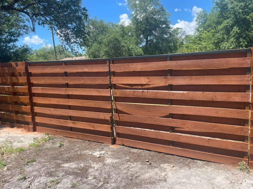 Horizontal Shadowbox Fence in Port Charlotte by True Fence LLC