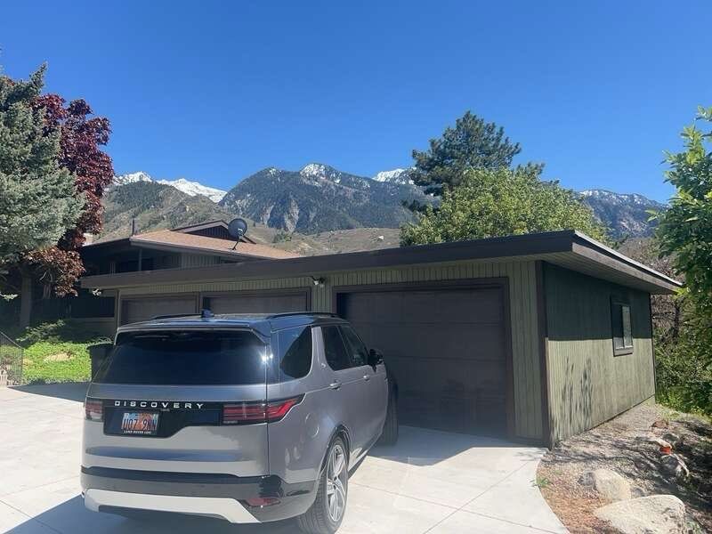 Complete Hardie Colorplus Board and Batten replacement with Custom Soffit Transformation in Sandy by Ideal Siding Utah