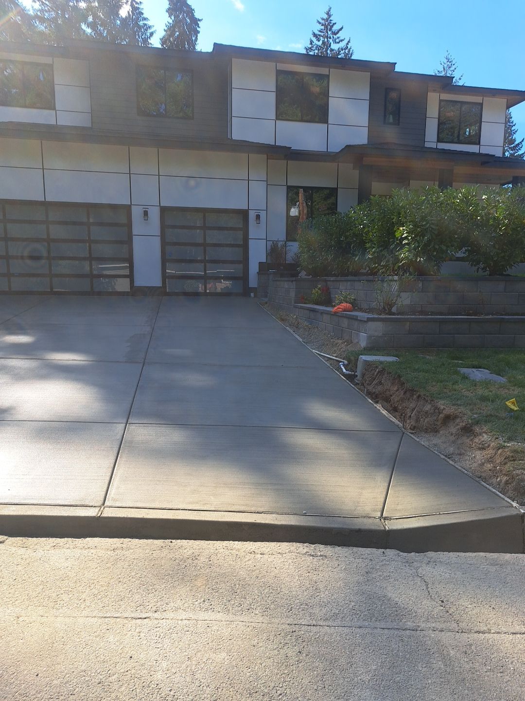 Bruce | Broom Finish Driveway, Concrete Project by Jireh Asphalt & Concrete Inc 