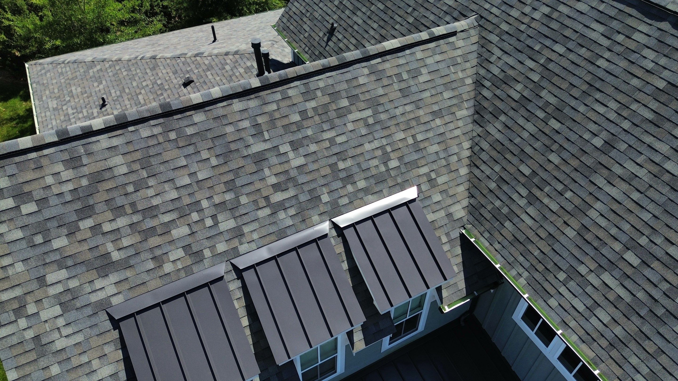 Residential Roof Replacement and Bronze Gutter Installation in Franklin by Shinglesmiths Roofing