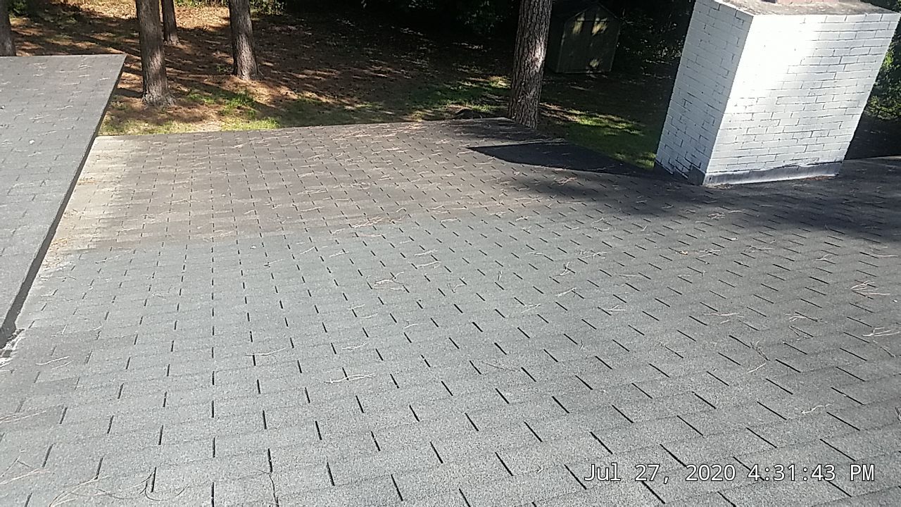 Re Roof (metal roofing) by American Roofing NC