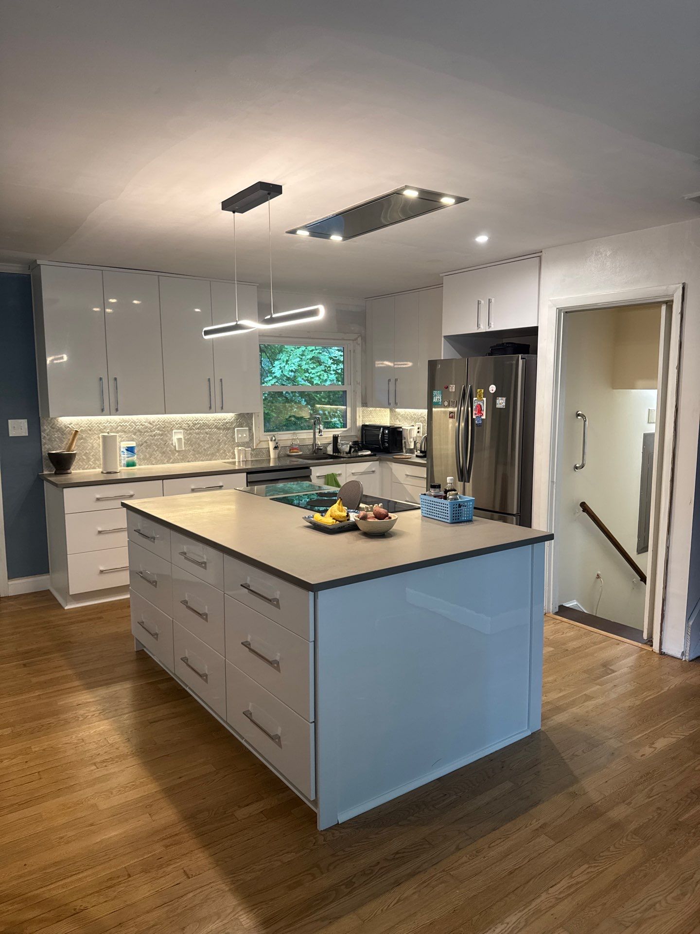 Modern Kitchen Remodeling with Large Central Island in Doraville by Swift Home Renovations