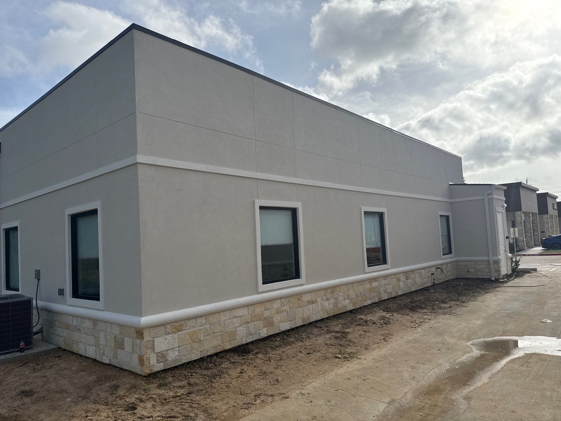 Commercial Façade Excellence with Bullnose Detailing by Apex Conventional Stucco Llc