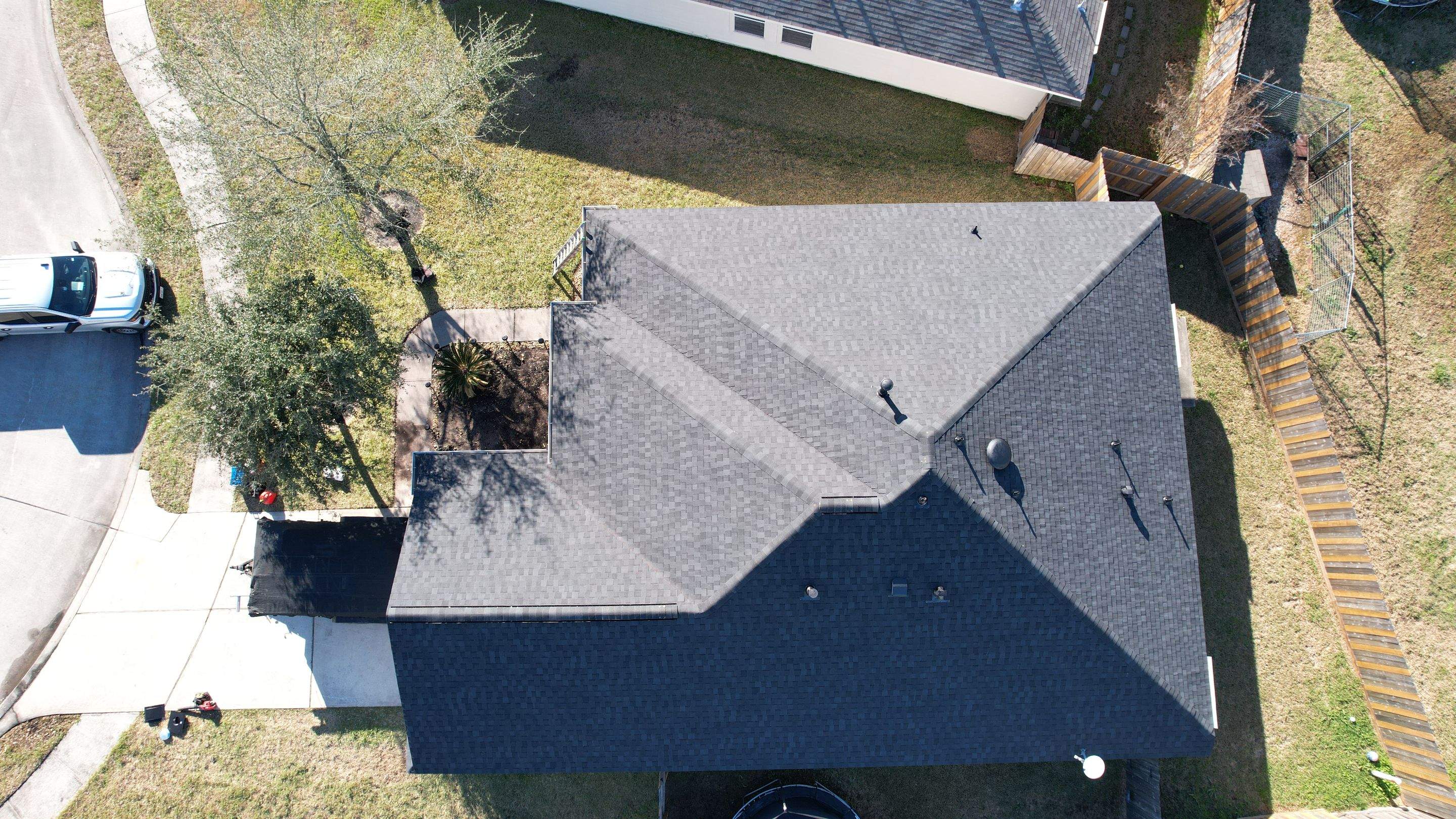 Charcoal Hip-Roof Replacement — Humble, TX by PL Roofing & SB Roofing, LLC.