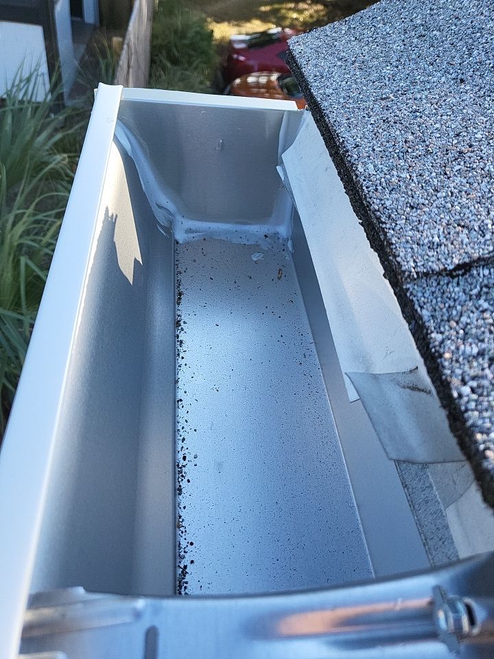 Seamless Gutter Installation Using White K-Style Gutters by Gutter Professors