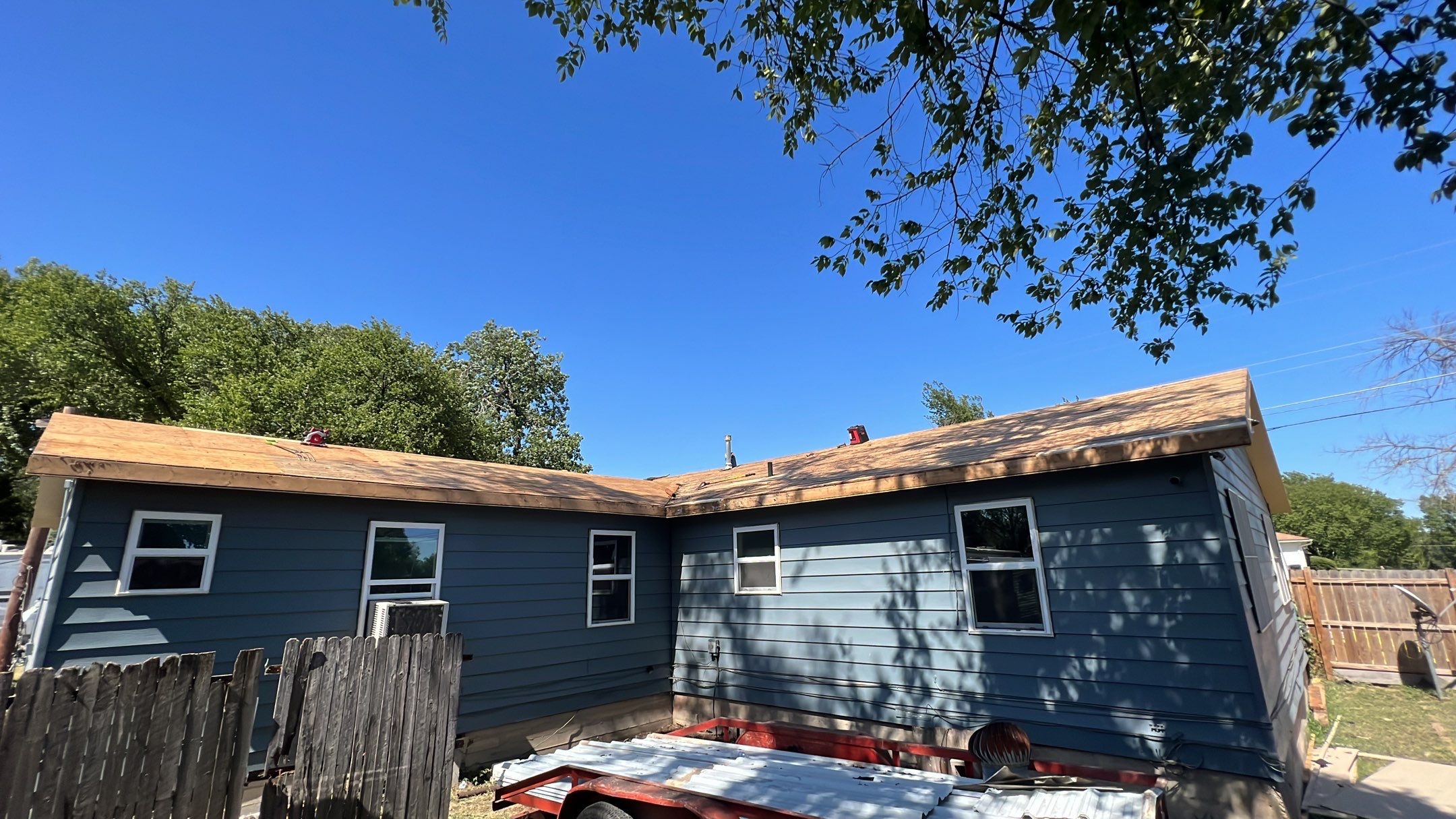 Residential Roofing Installation using PBR Metal Roof by Harvey Roofing & Construction