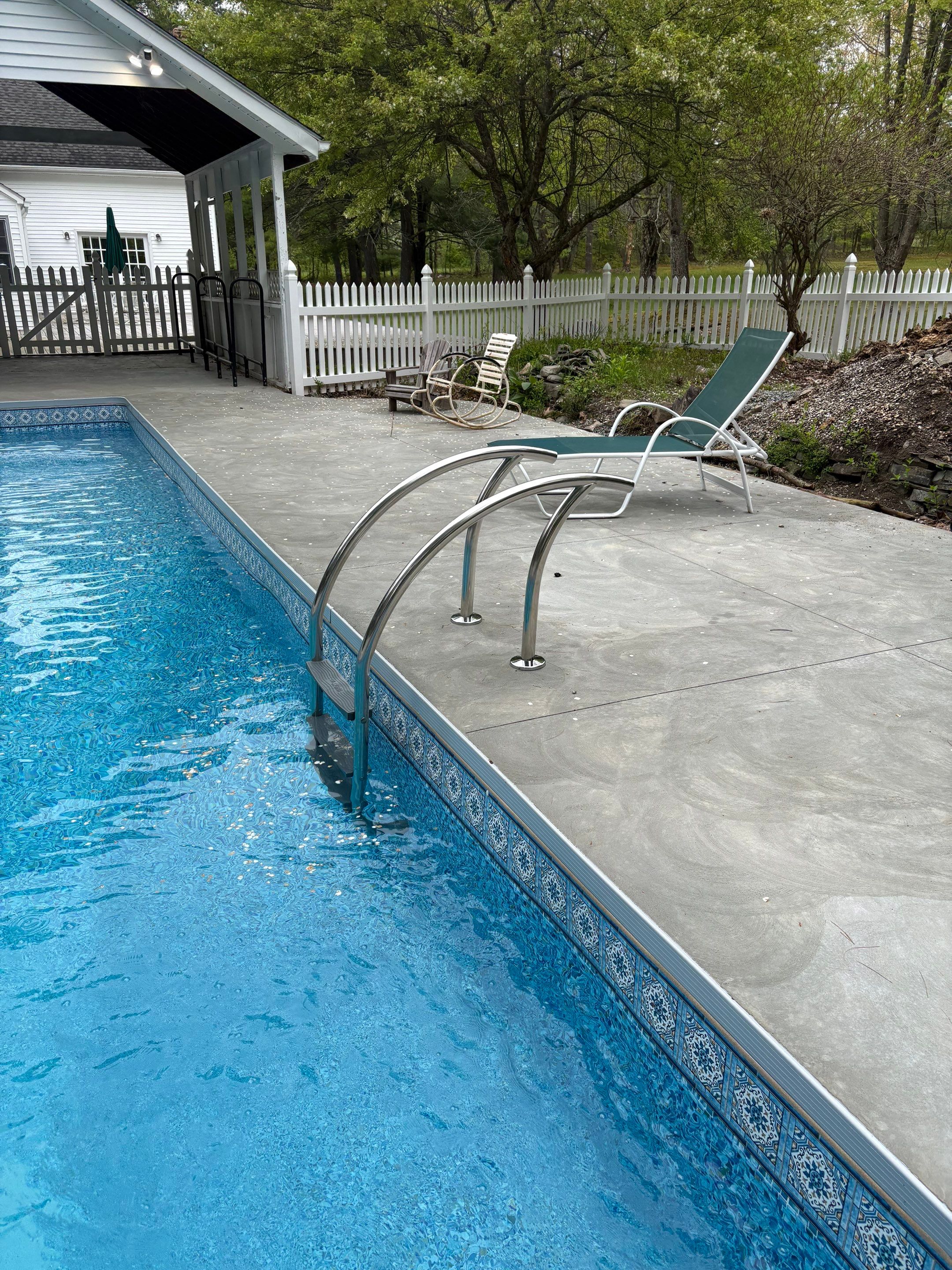 In-Ground Swimming Pool Renovation and Concrete Decking in Old Chatham by Cypress Pools and Spas