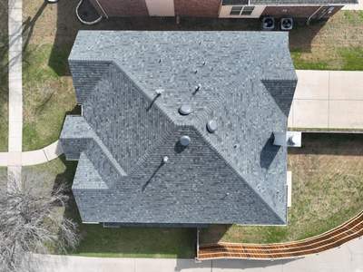 Residential Roofing Installation using Owens Corning TruDef Duration Storm Estate Gray