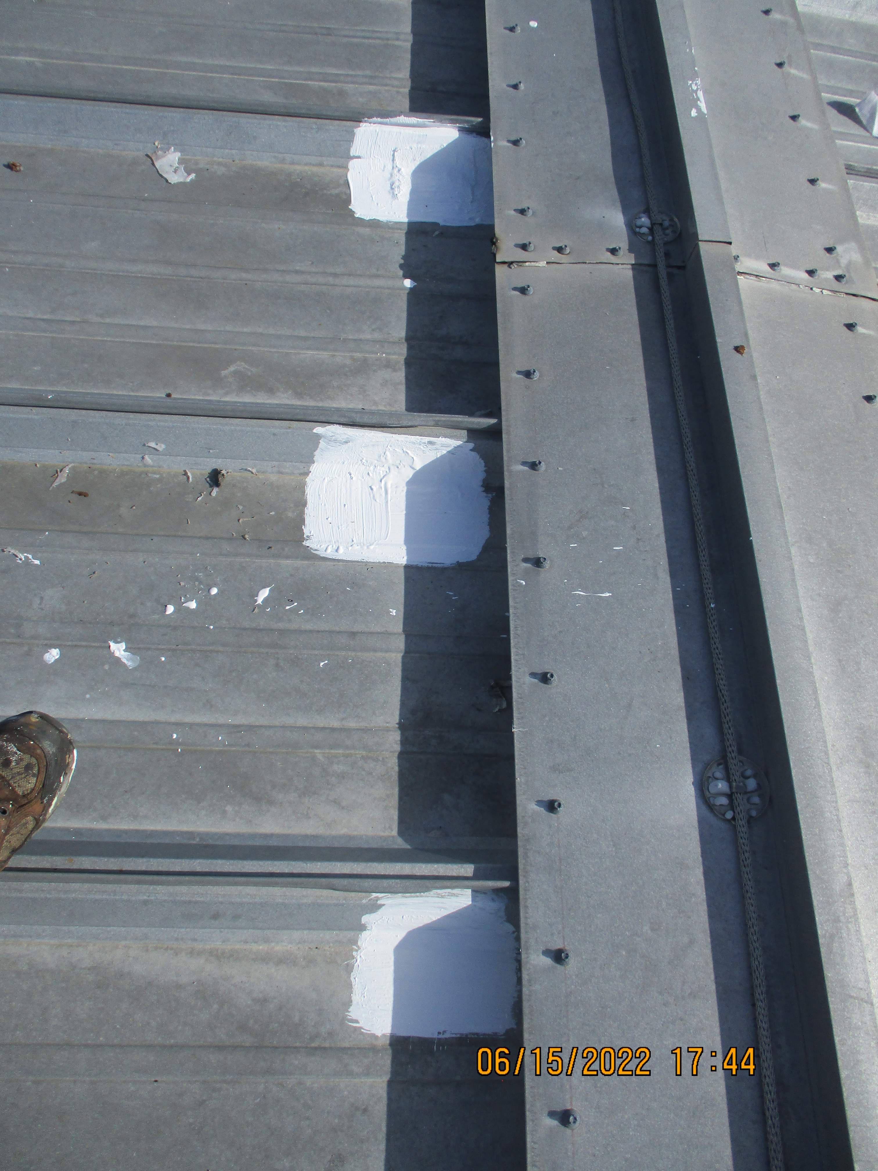 Calder Casino & Race Track Partial Metal Restoration  using #924 Eterna-Sil Premium Silicone Roof Coating by Morton Roofing, Inc.