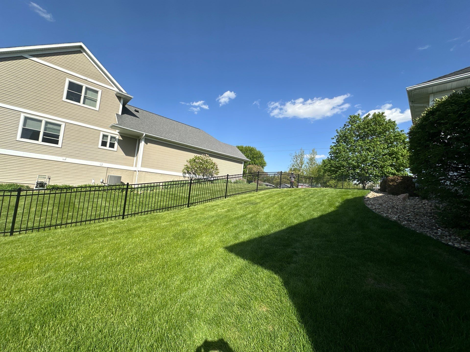 Black Ornamental Metal Picket Fence Installation in Waterloo by Perfect Picket Fence and Stain