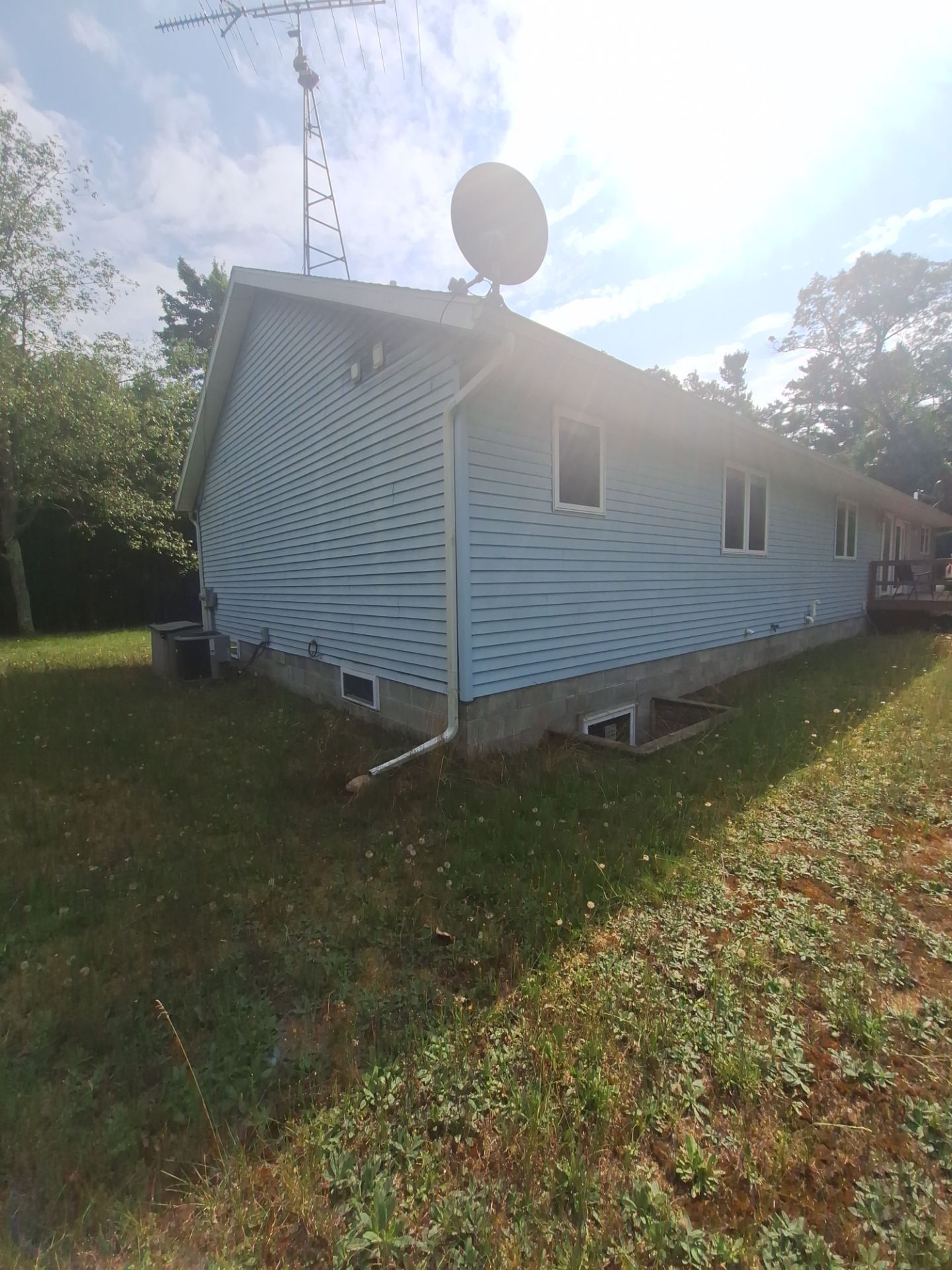 Deck staining and exterior foundation painting! by Gordon Painting