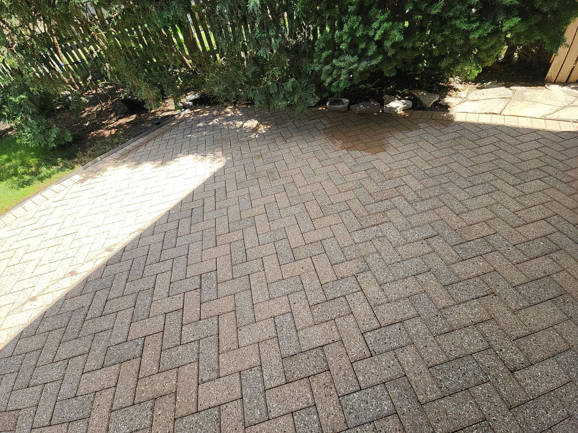 Brick paver cleaning  by Northern Power Washing LLC.
