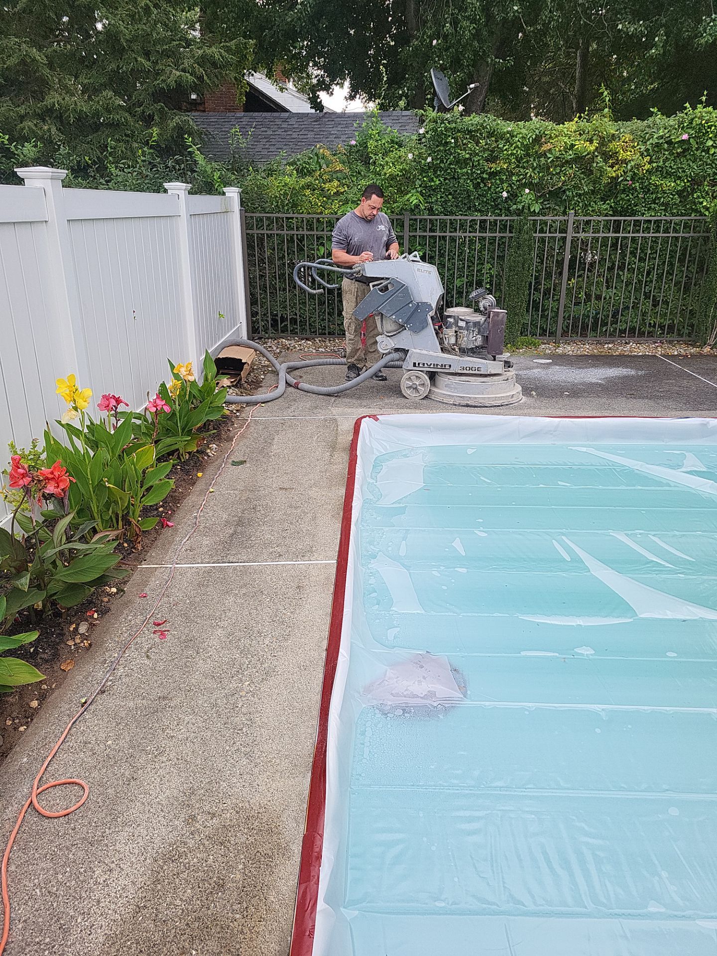 Blue Granite Pool Patio Concrete Coating in Lincoln Park by Spectrum Painting, LLC
