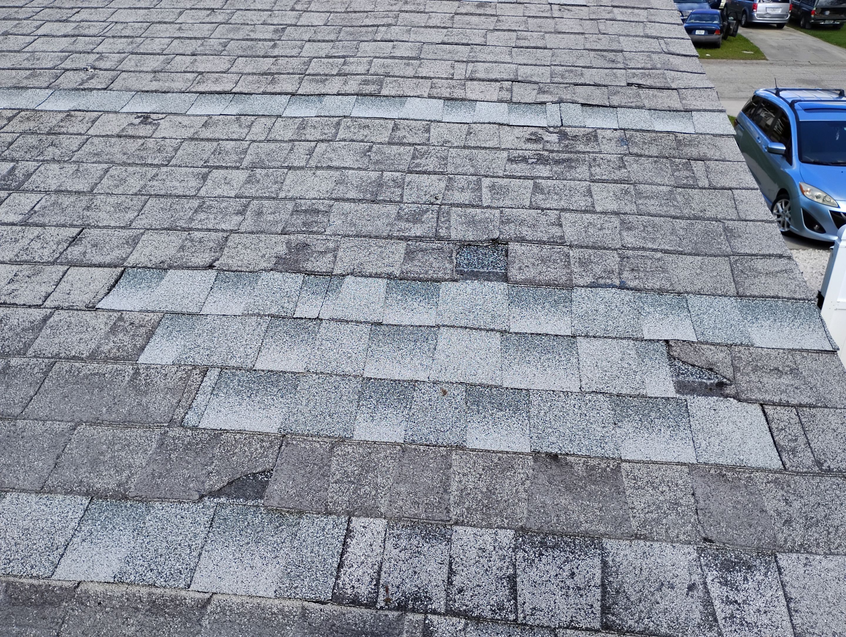 Onyx Black Shingles by Reimagine Roofing