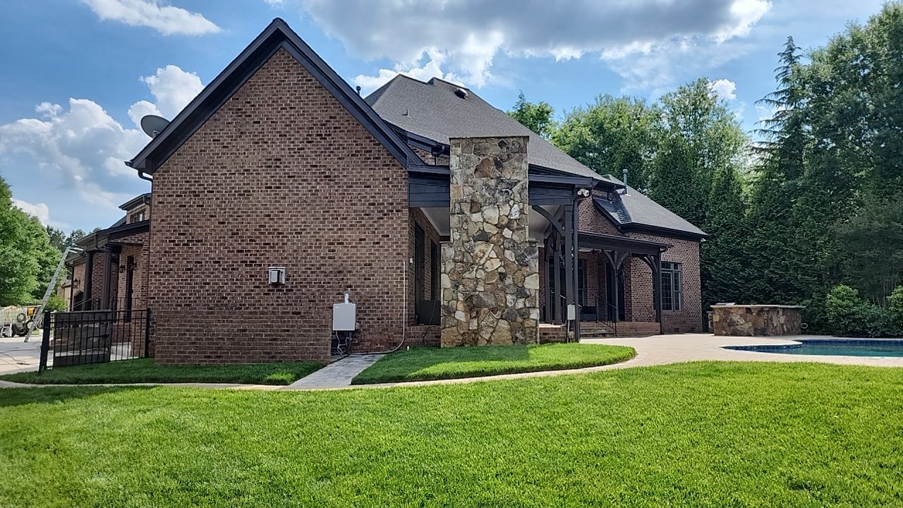 House Wash using cleaner by Power Wash Masters LLC