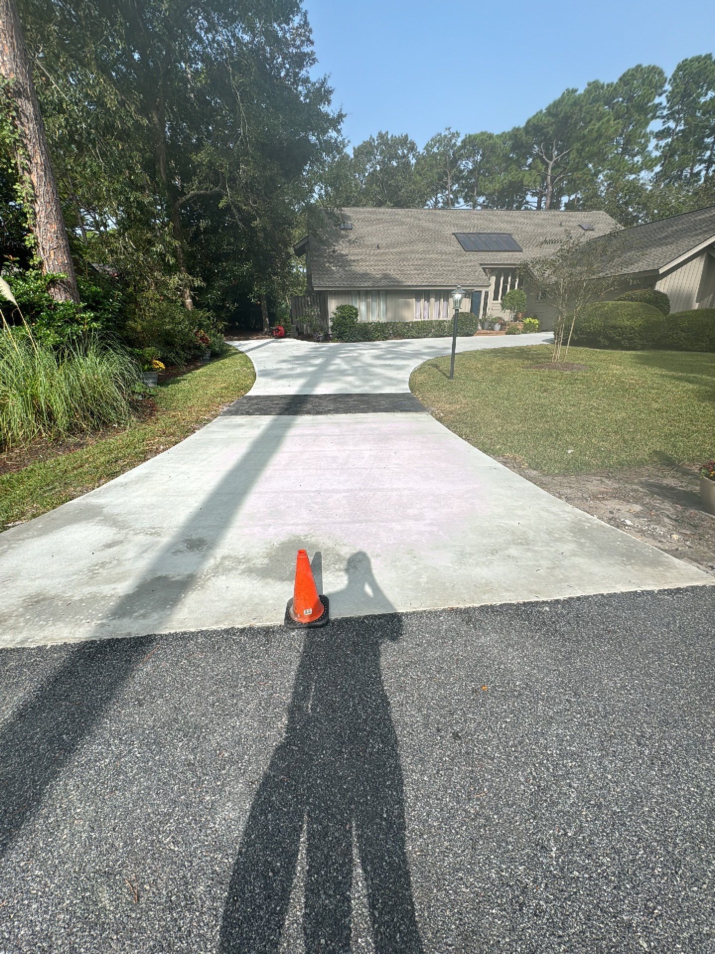 Concrete Driveway Replacement with Decorative Paver Inlay in Hilton Head Island by Lowcountry Scapes, LLC
