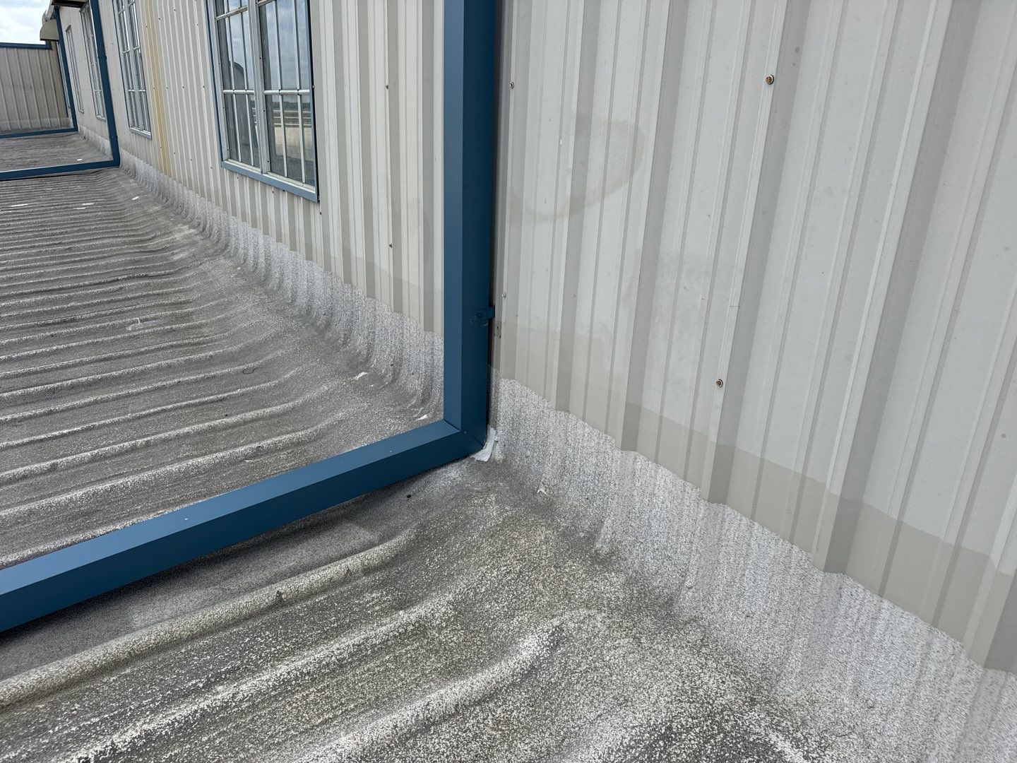 Airport Building Gutter Repair by CES Roofing