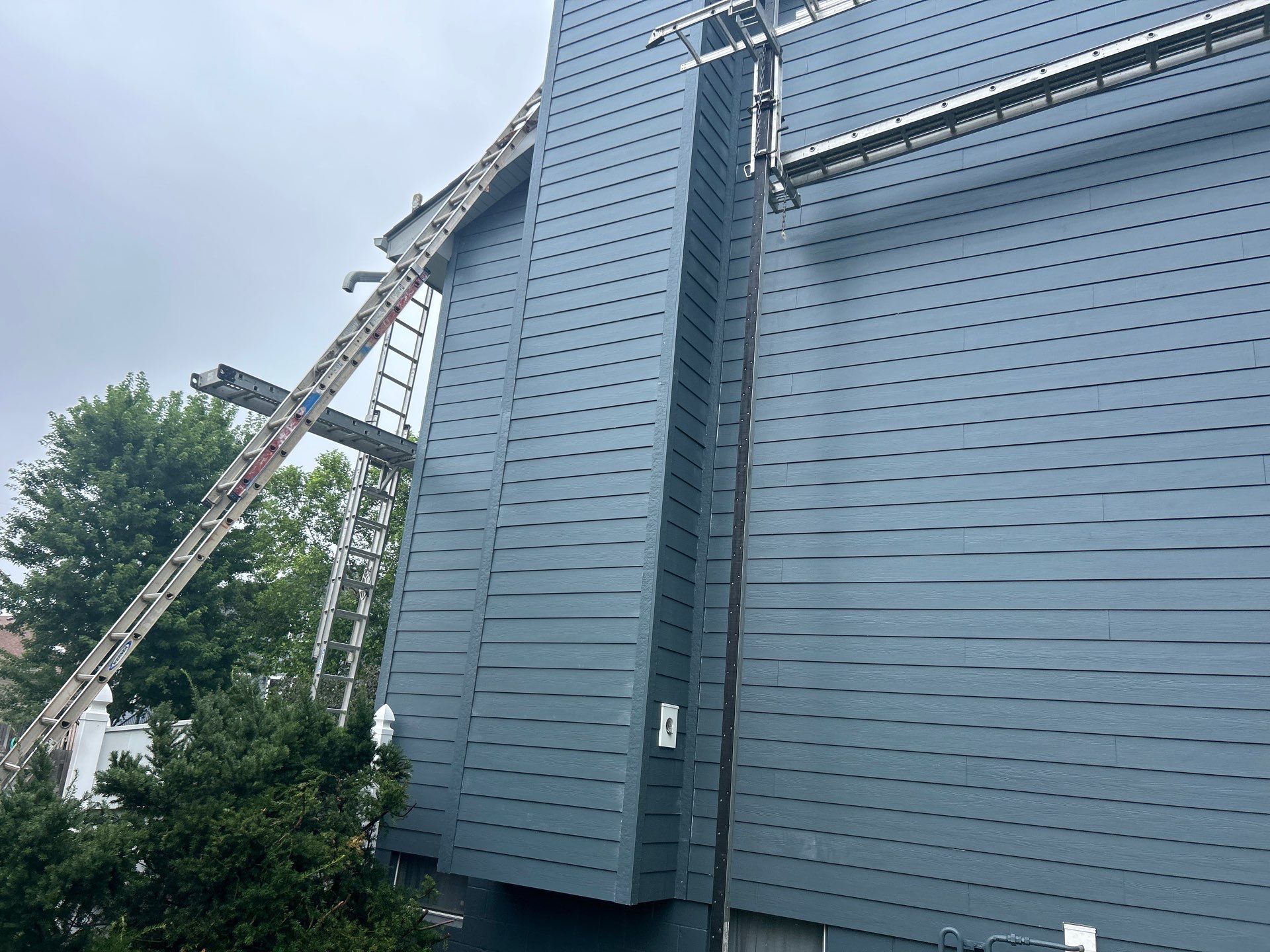 James Hardie Siding Transformation in Omaha with Evening Blue by Carps Complete Exteriors 