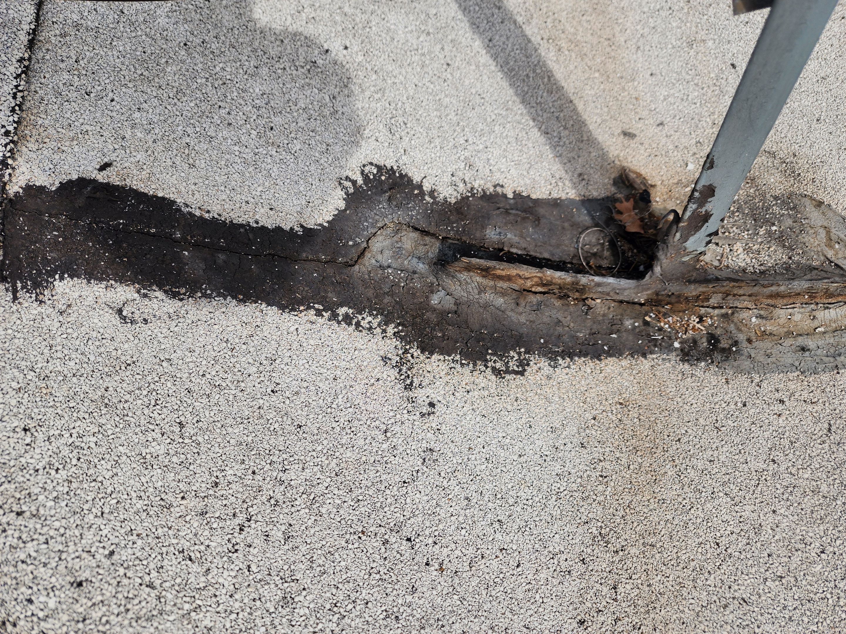 Foam and coatings on commercial roof by Straight Edge Roofing Inc