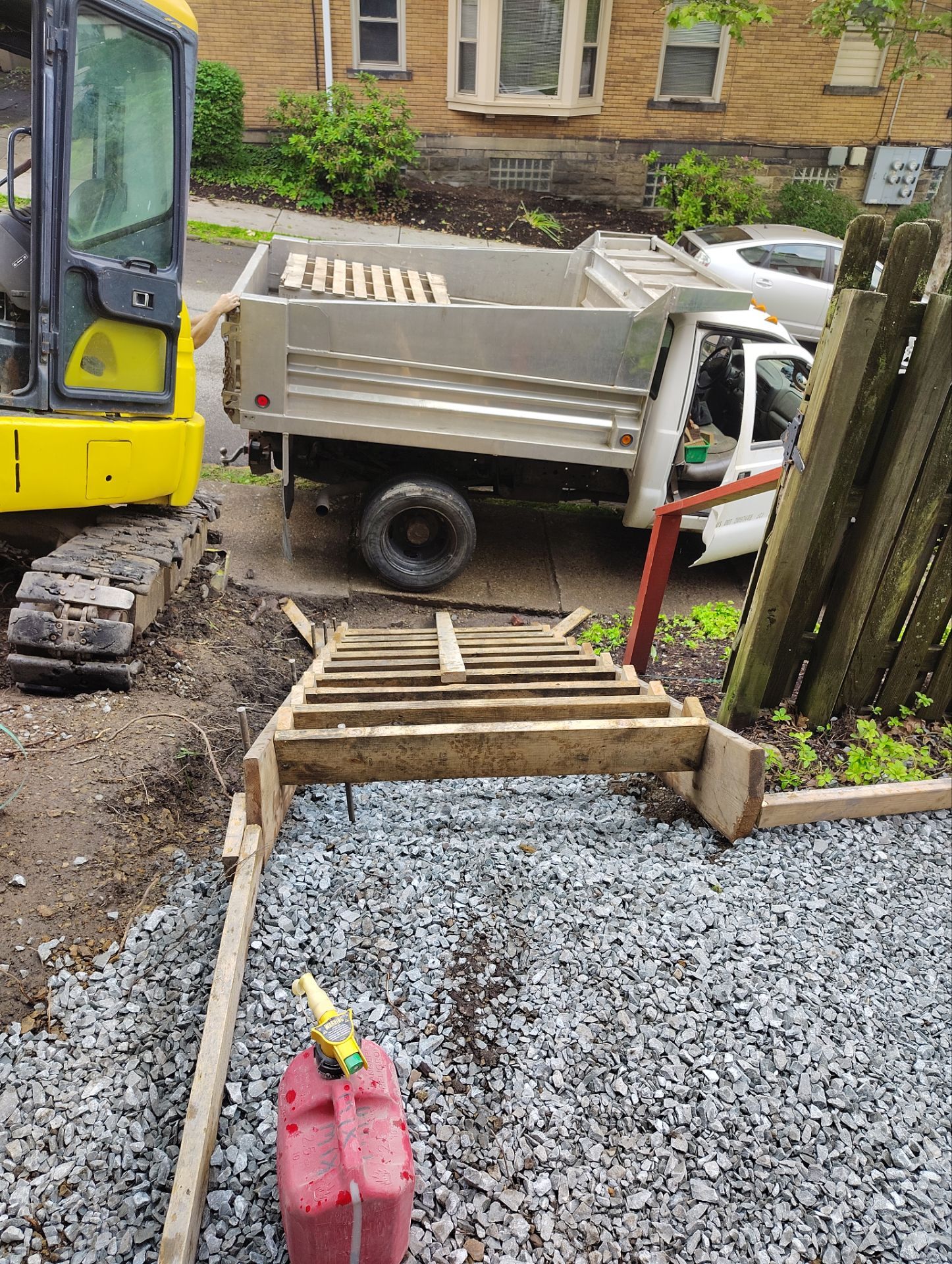 Stamped Concrete and Retaining Wall by Cousins Roofing Siding & Decks