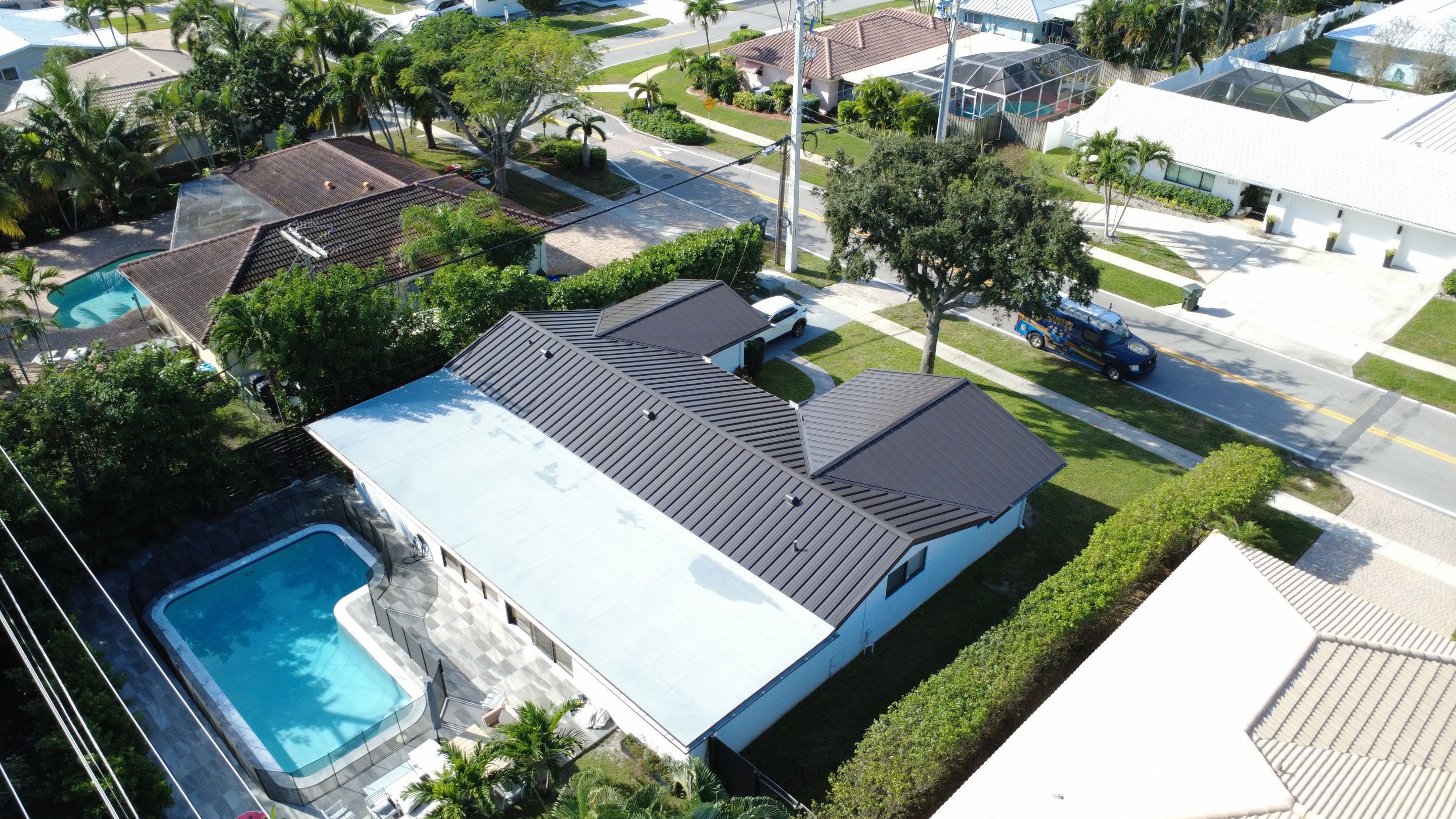Residential Roofing Installation using 1" Nail strip metal roof by BLUES BROTHERS CONSTRUCTION CORP