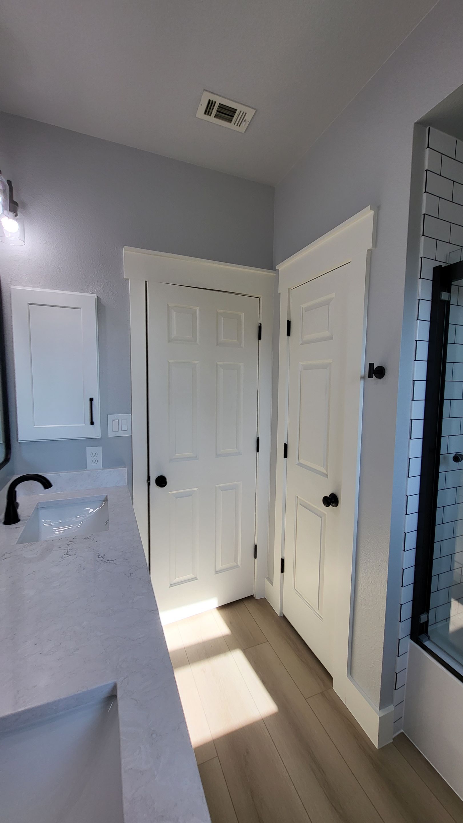 Stone Oak Bathroom Refresh with Modern Subway Tile Before and After by Legacy Bath and Kitchen