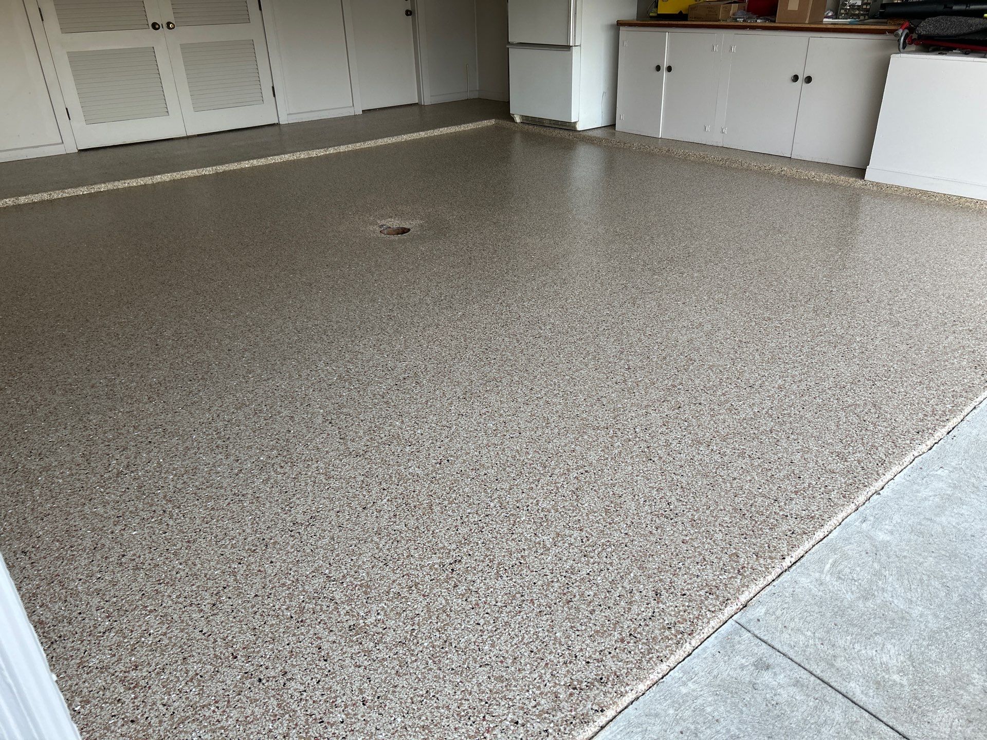 Pecan Floor Coating in South Bend! by Innovative Spaces / Innovative Concrete Coatings