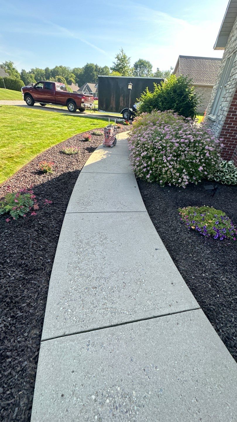 Driveway + Garage + Walkway Project in Meridian by Floors in a Day, Inc