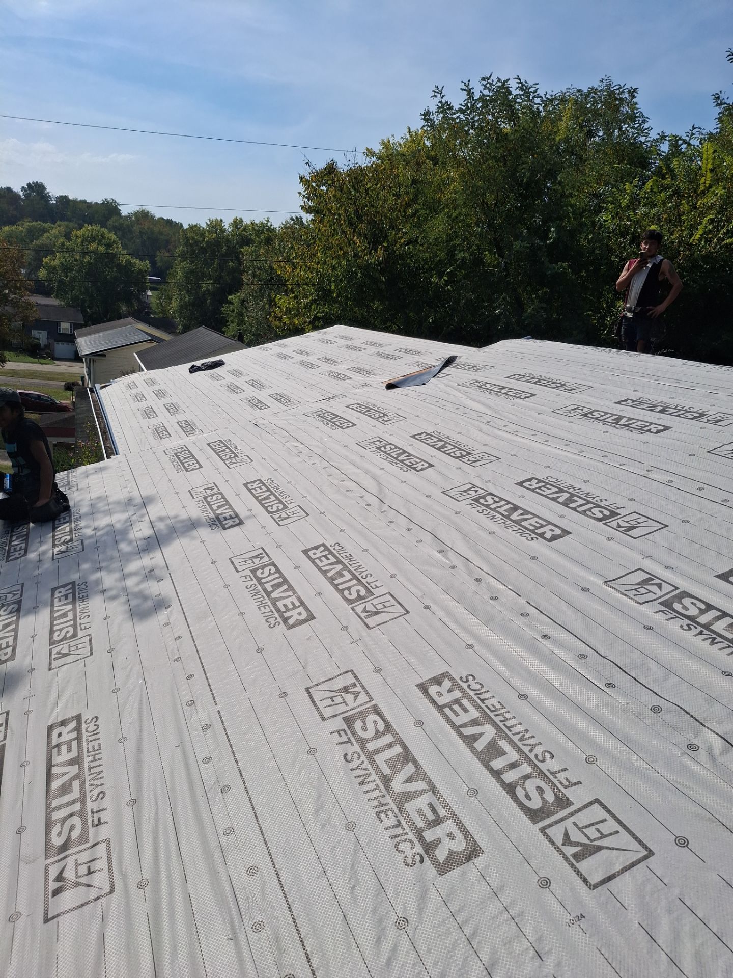 Residential Roofing Installation using Metal by Rainstoppers Roofing