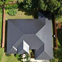 24ga 1.5" Mechanical Seam Matte Black by Total Roofing System The Metal Roof Experts