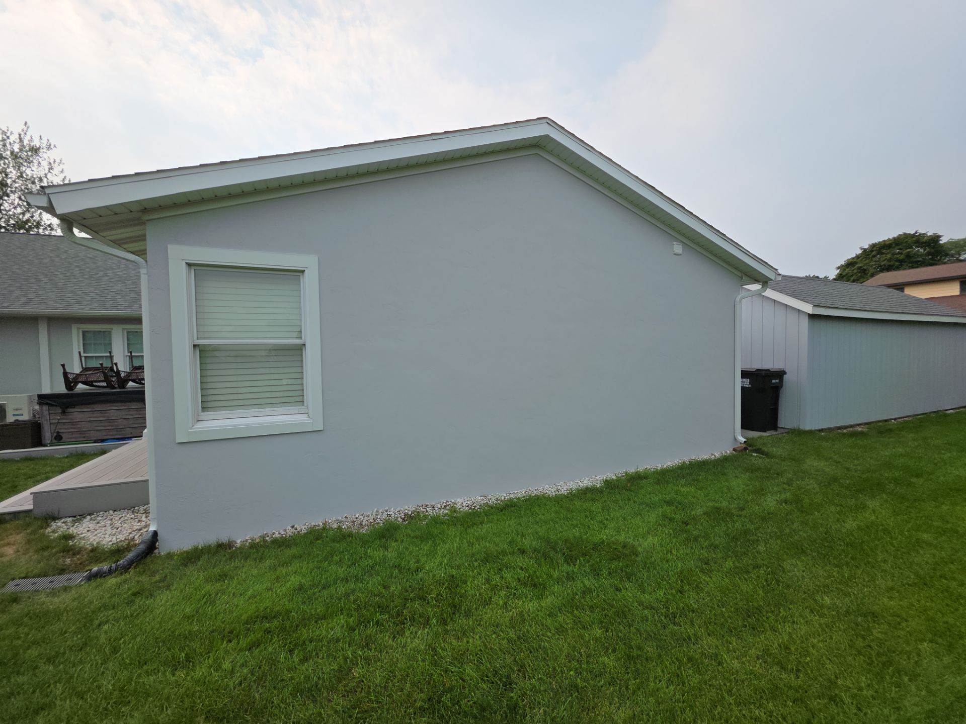 Norton Shores Residential Stucco Repair and Exterior Painting Refresh by Gordon Painting